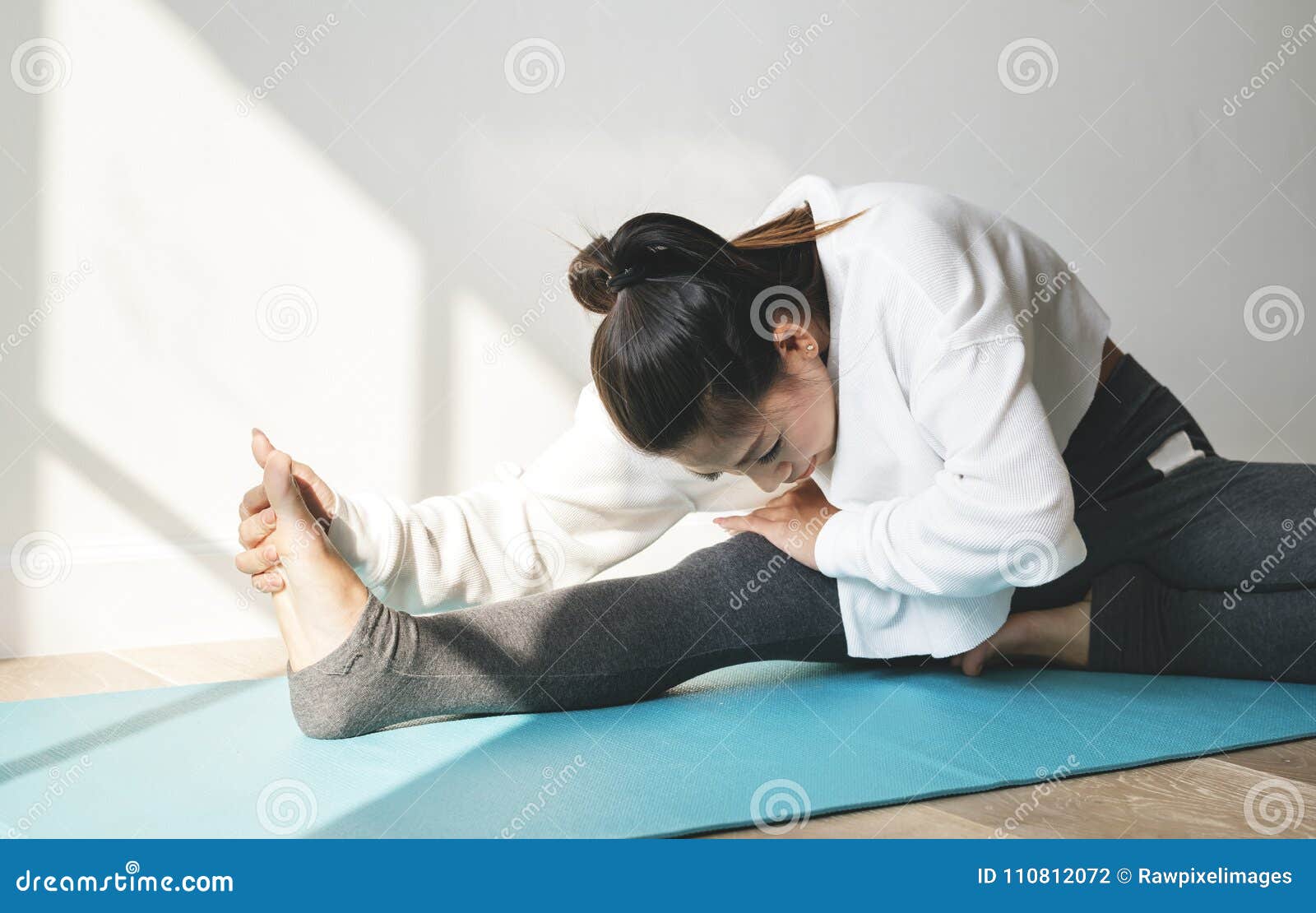 asian woman stretching yoga practise
