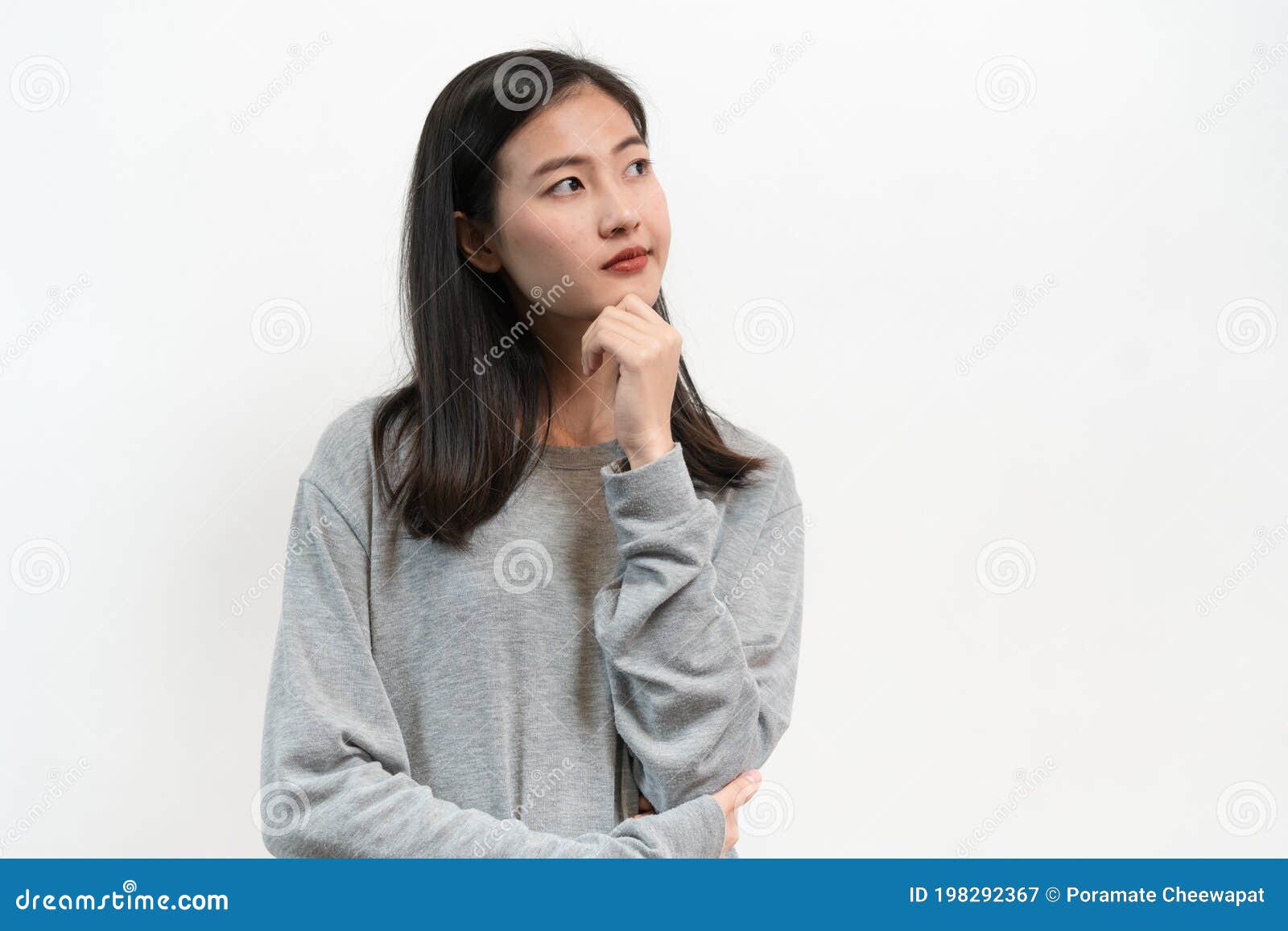asian woman thoughtful thinking  on white back ground in studio