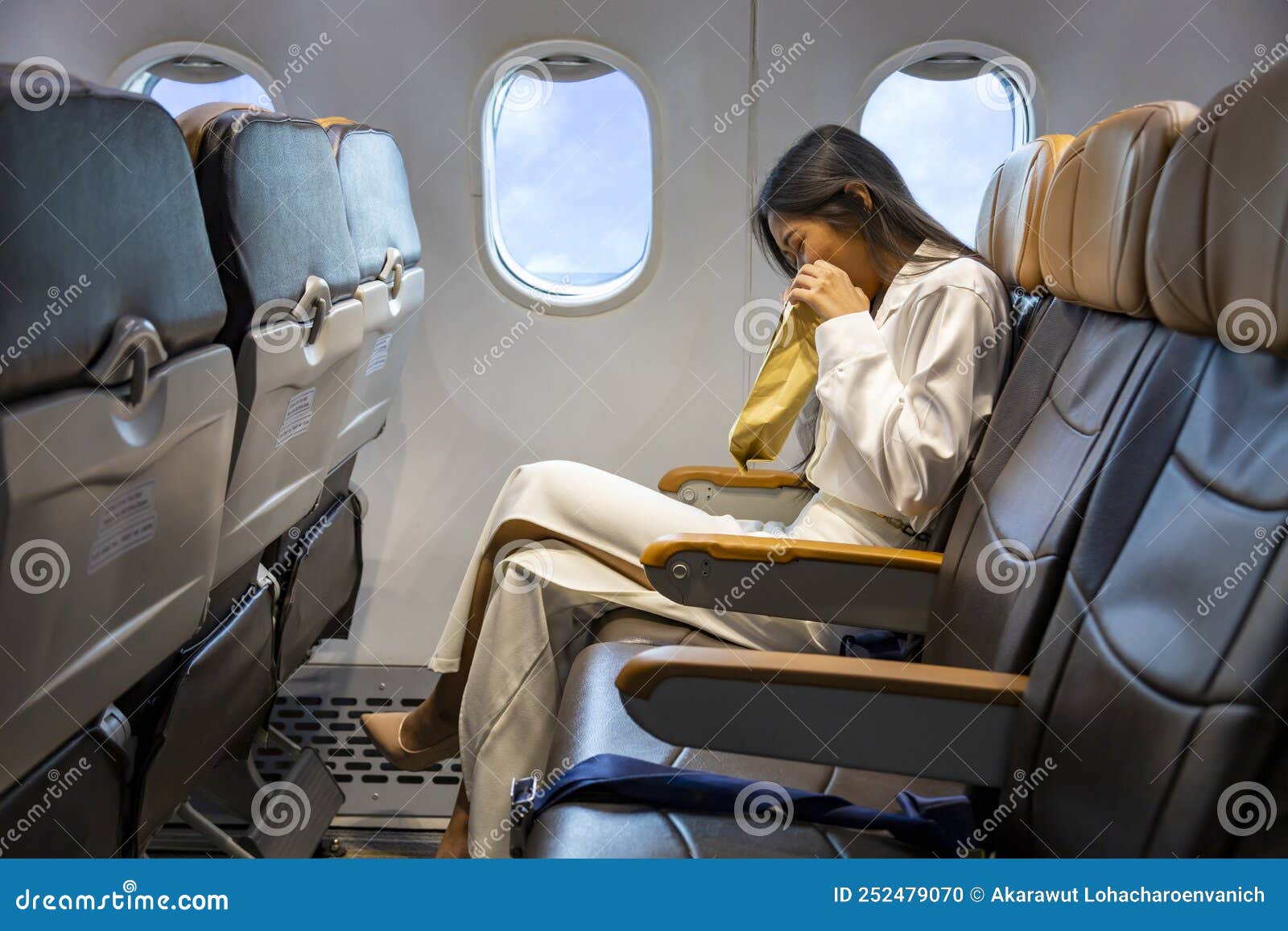 Sick  travel motion sickness bag for safe collection  holding of vomit if  someone is ill in the back of a plane seat during an airplane flight 112  Stock Photo  Alamy
