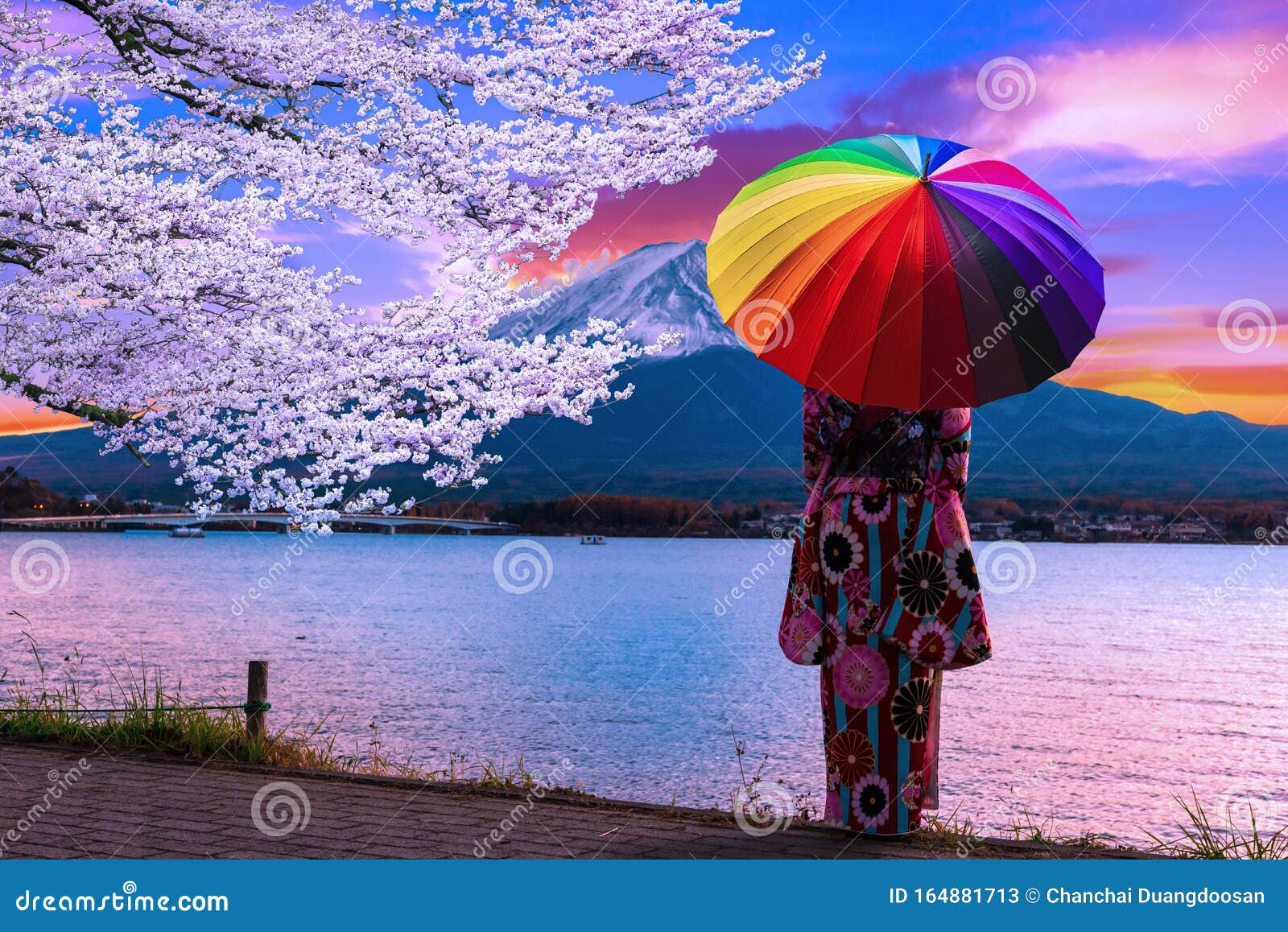 Girl holding umbrella rainbow japanese