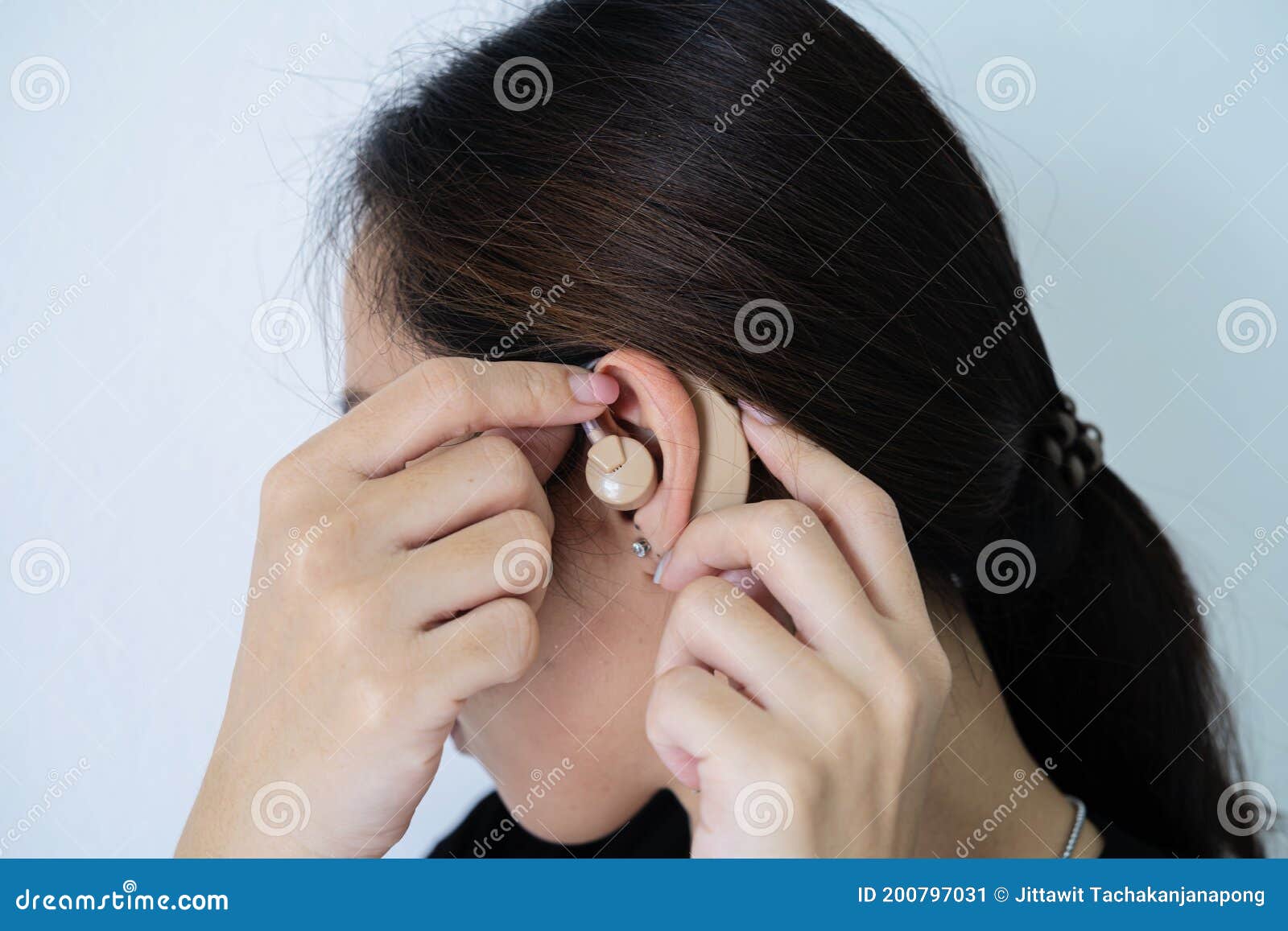 Asian Women Are Wearing Hearing Aids In Order To Hear Better Stock Image Image Of Closeup 
