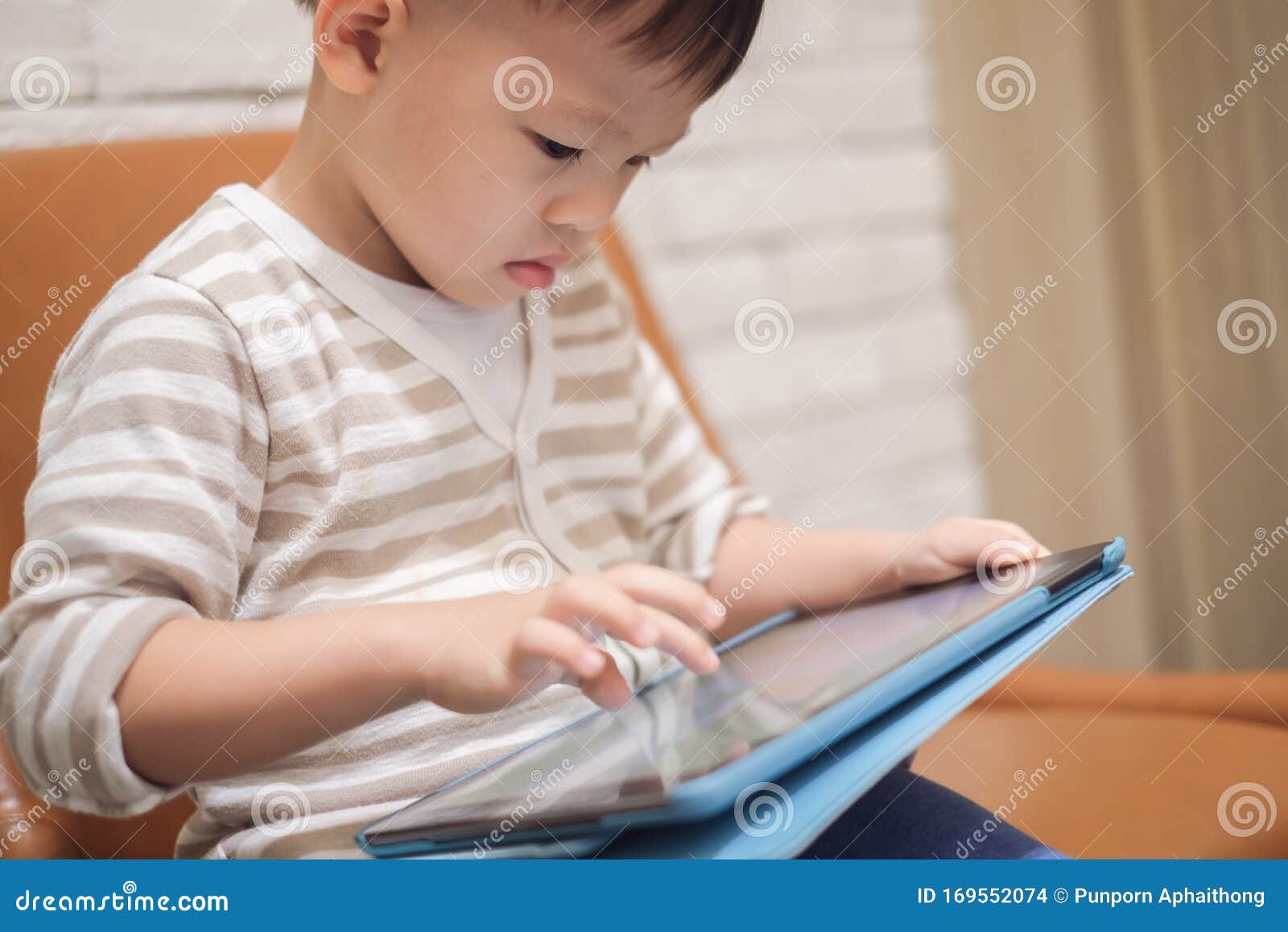 Asian 2 3 Years Old Toddler Boy Child Using Tablet Pc Playing Ga