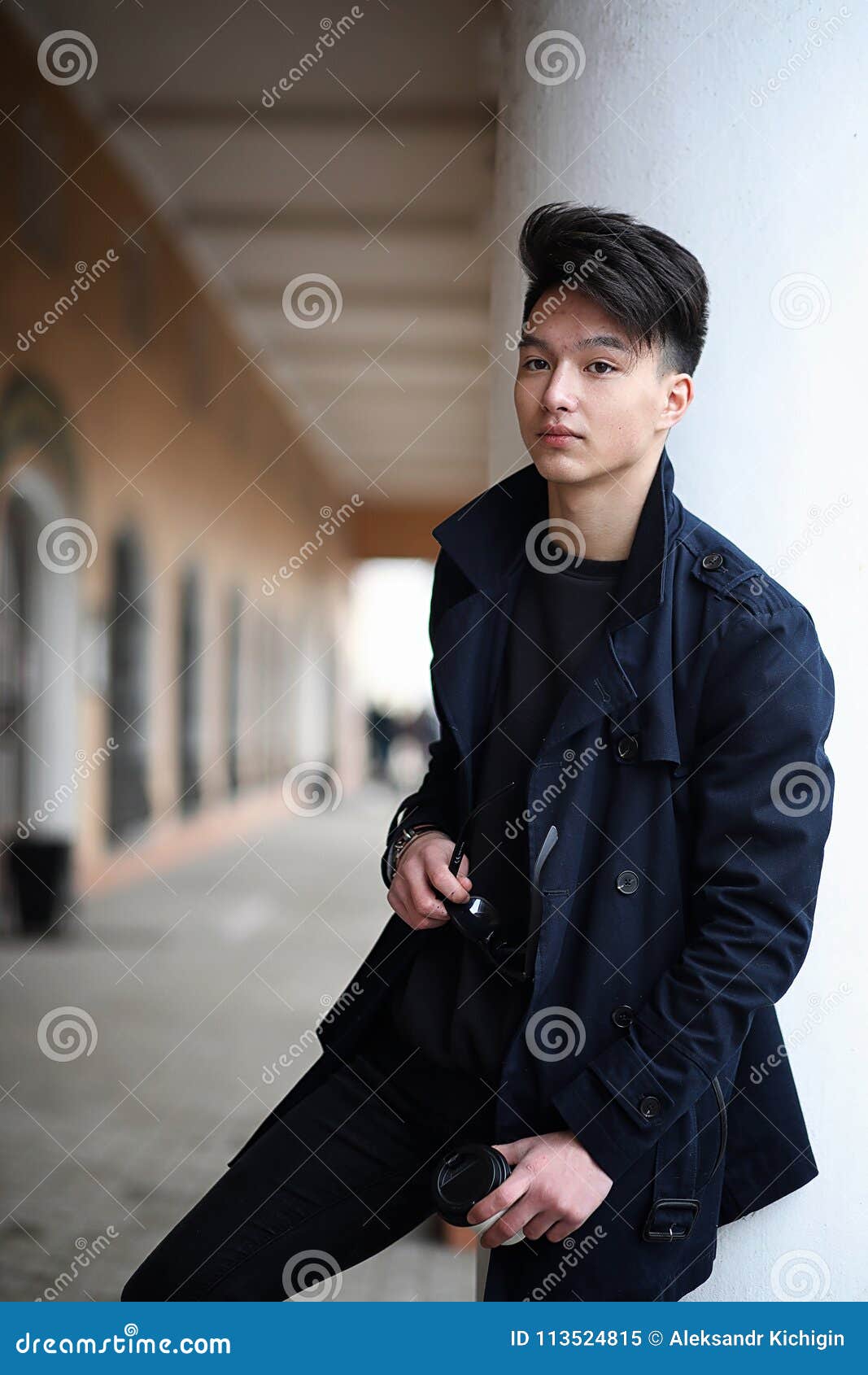Asian Young Man in a Coat on the Street Stock Image - Image of male ...