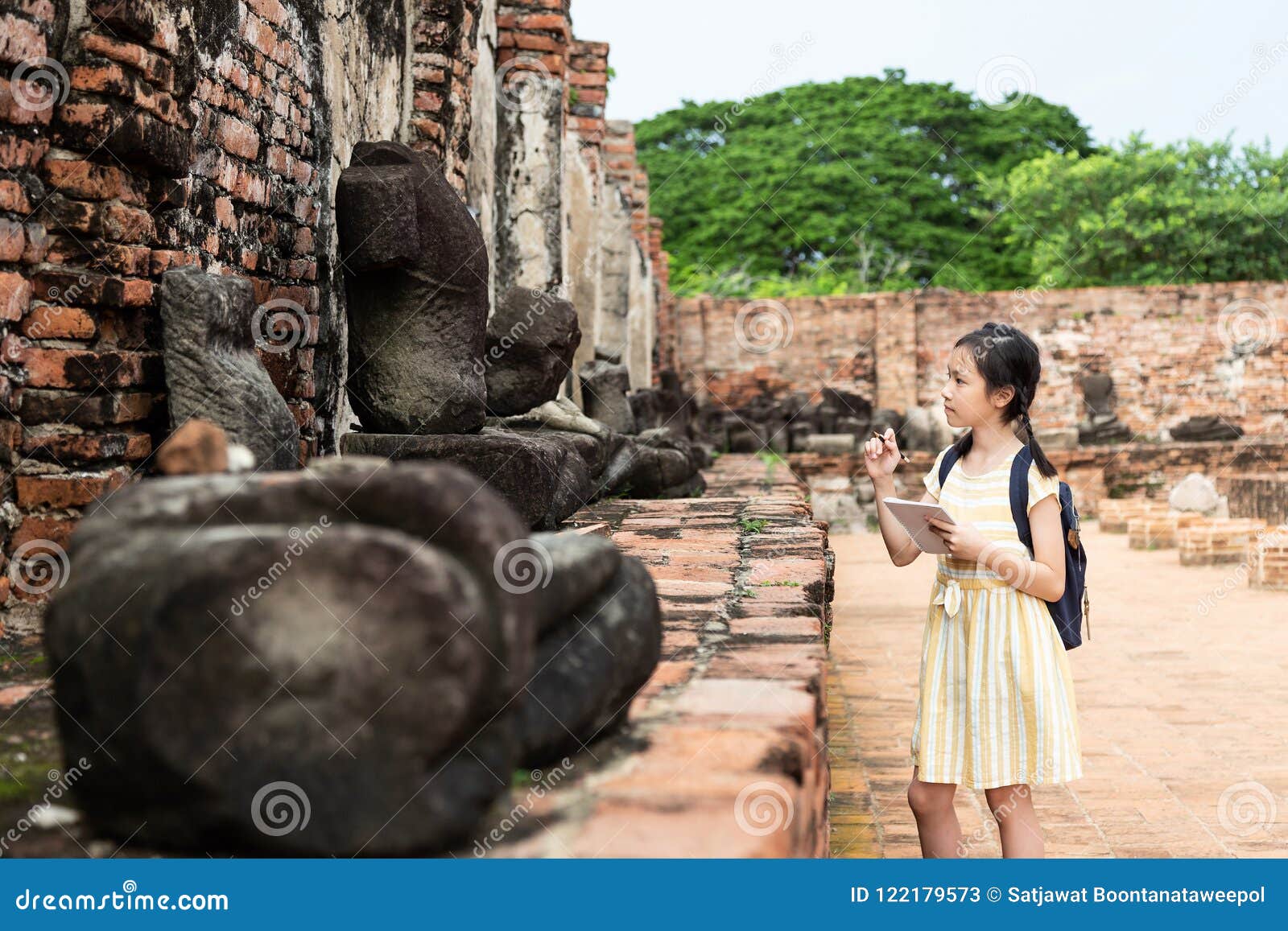 asian young girl is study and learning antiquities,field trip,a