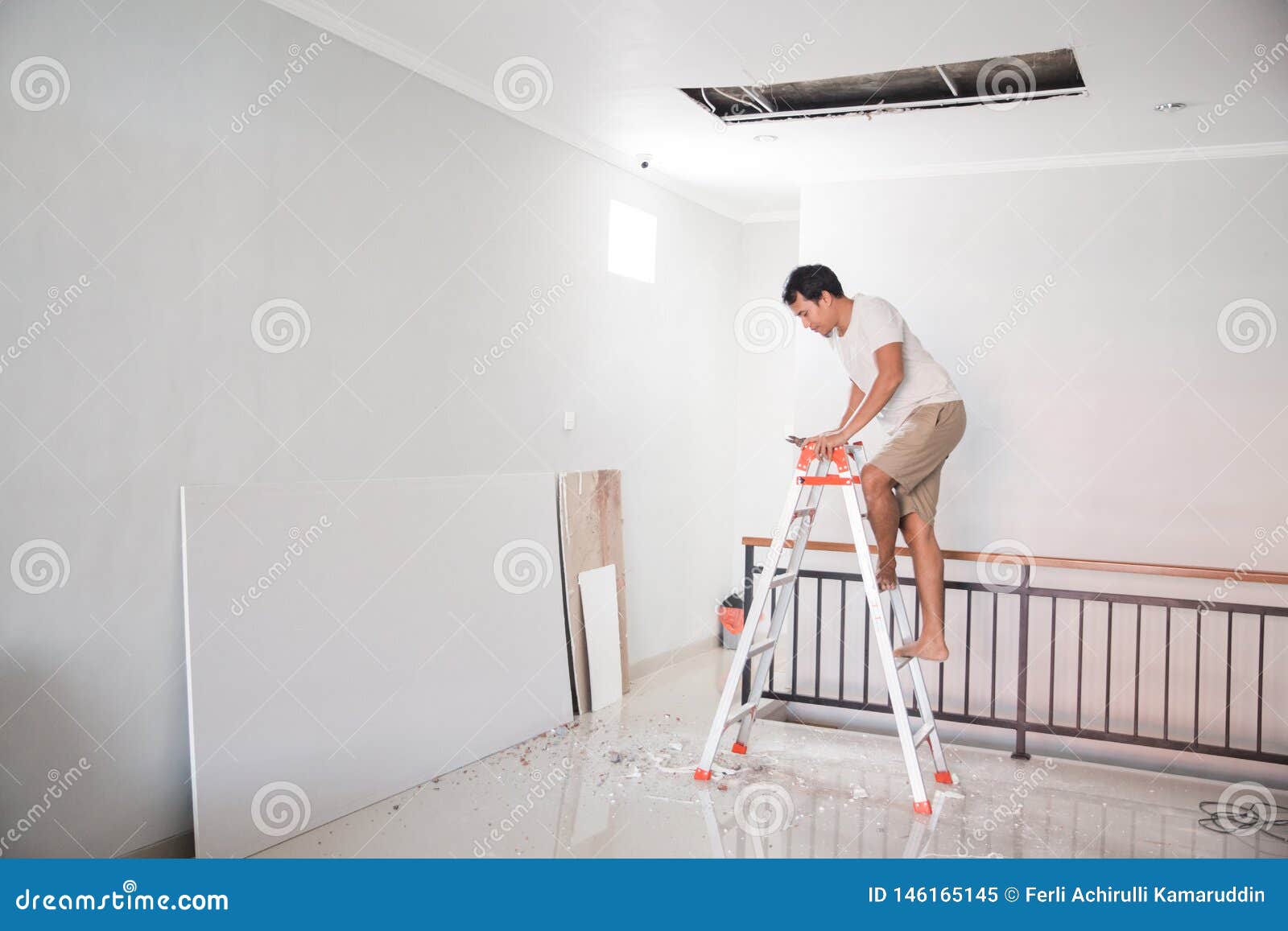 Man Repair The Broken Ceiling Stock Image Image Of Contractor