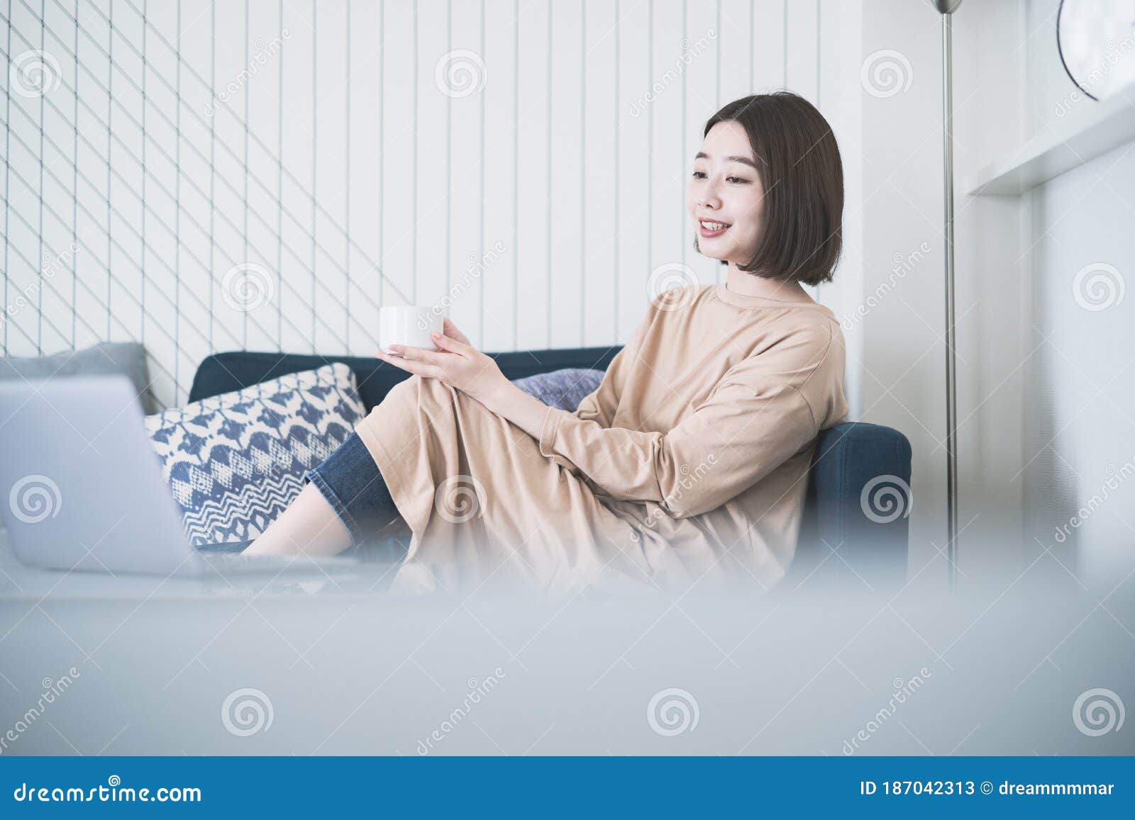 Asian Young Woman Looking at Laptop Screen Stock Image - Image of