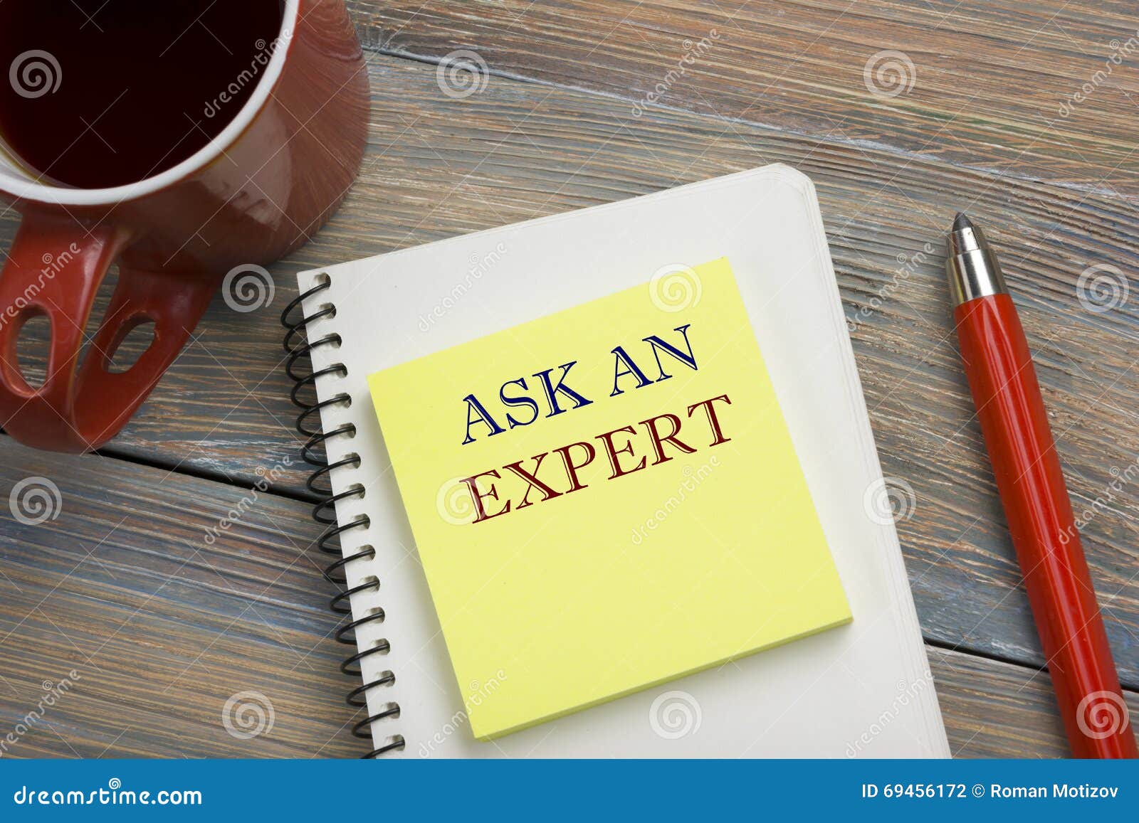 Ask an Expert. Notepad with Message, Red Pencil and Coffee Cup. Office