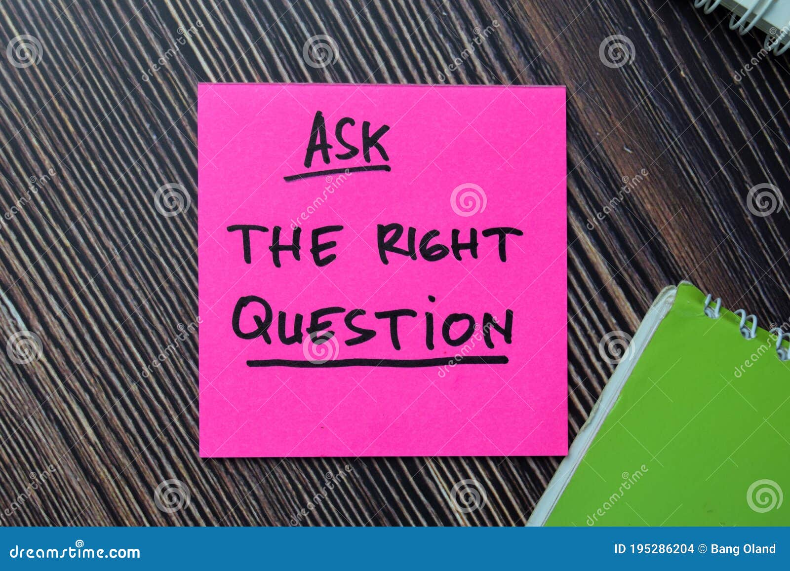 ask the right question write on sticky notes  on office desk