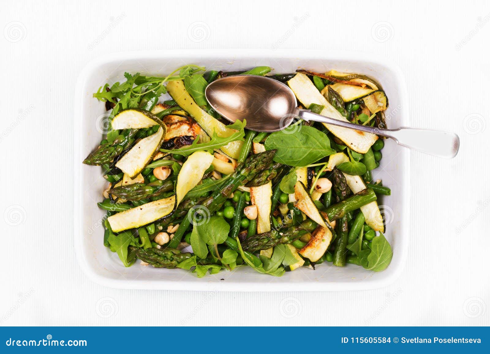 Asparagus, Courgette and Hazelnut Salad in a Rectangular Dish Wi Stock