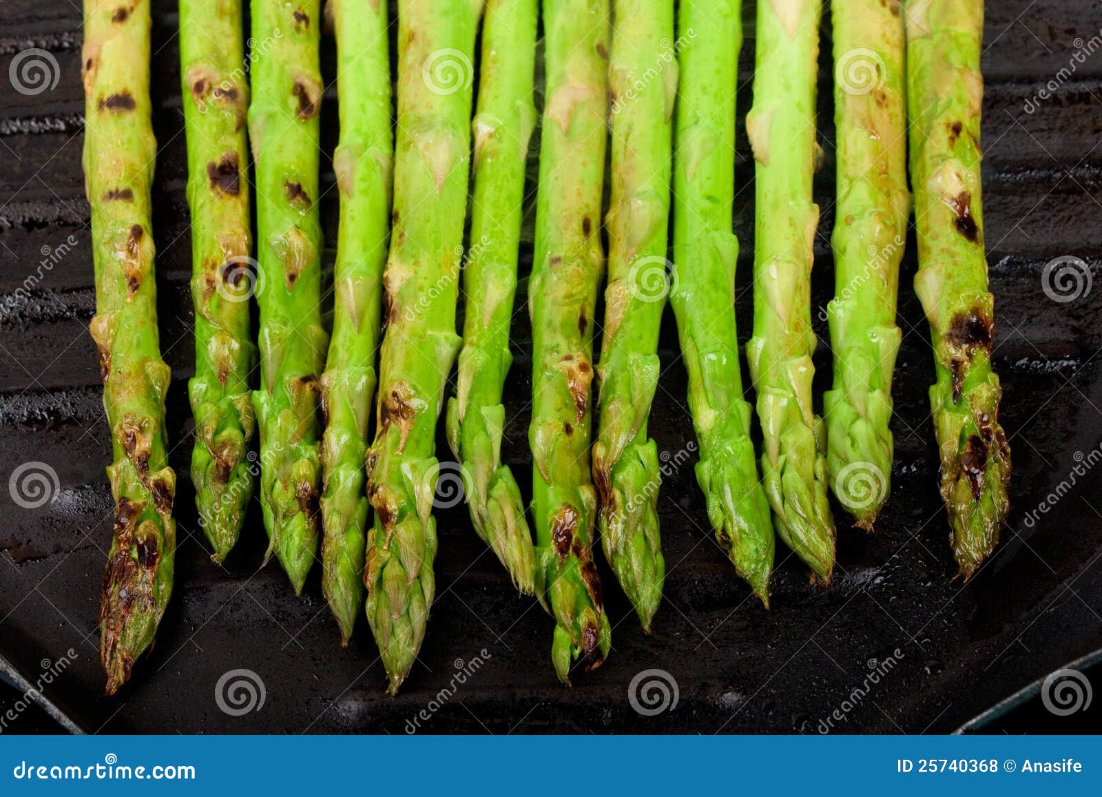 Asparagus on grill plate stock photo. Image of diet, cooked 25740368