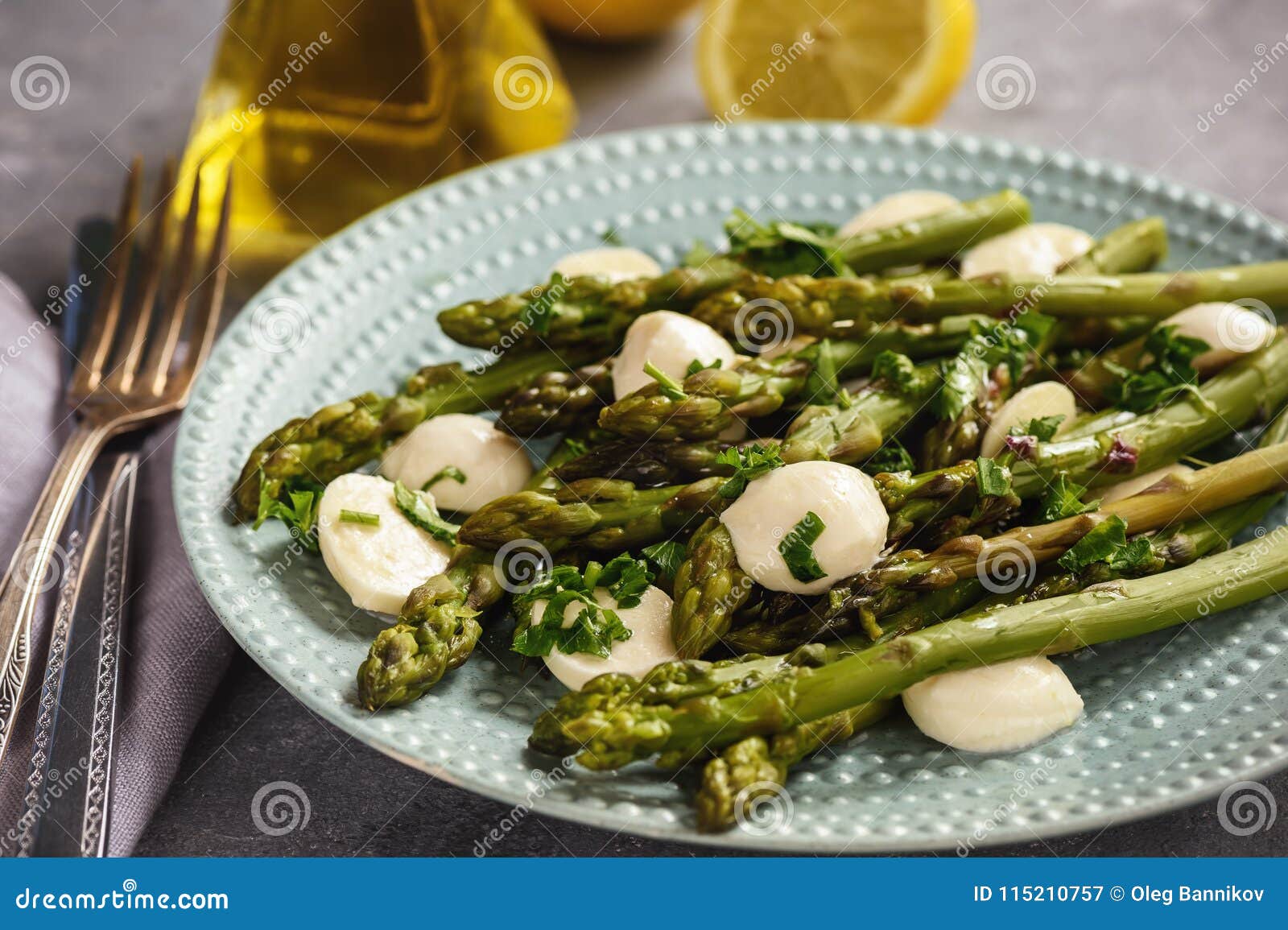 Asparagus with Mozzarella Cheese and Lemon Dressing. Stock Image
