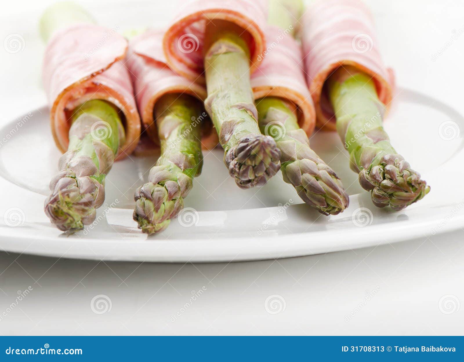 Asparagus served with ham stock image. Image of serrano 31708313