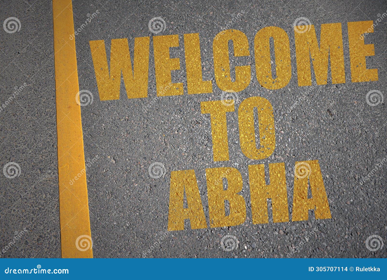 asphalt road with text welcome to abha near yellow line