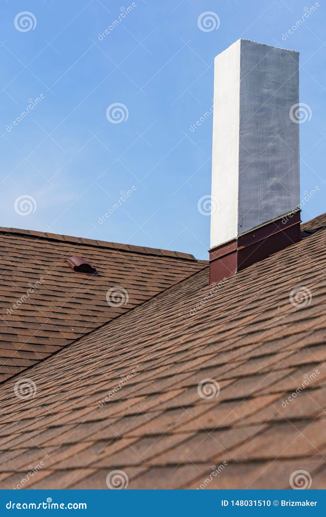 Asphalt Tile Roof With Chimney On New Home Under Construction Stock