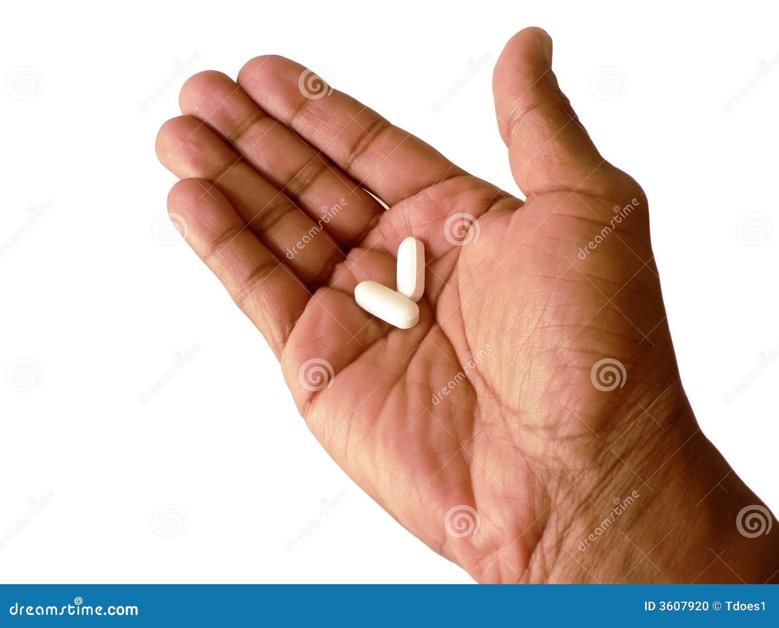 aspirin in open hand