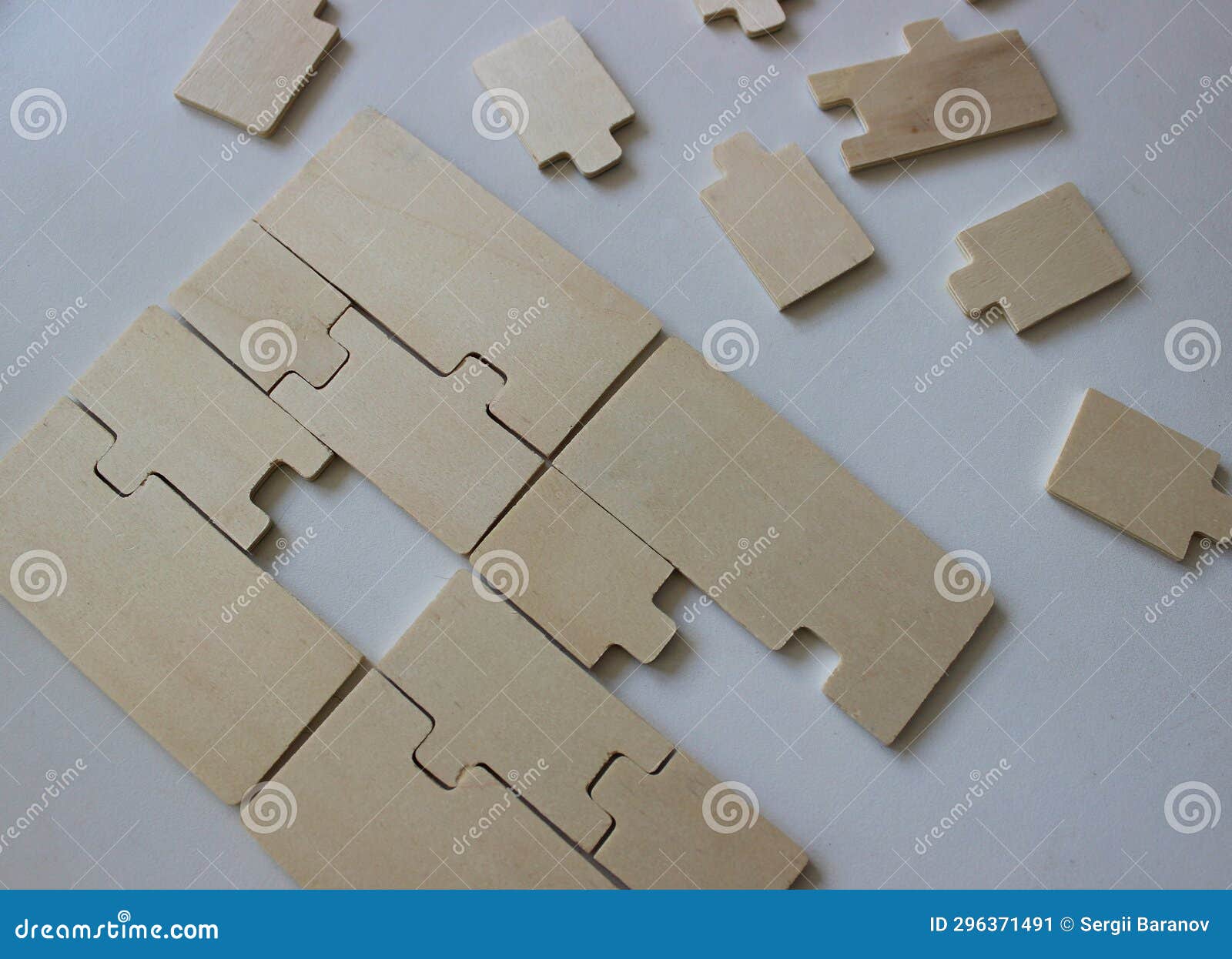 Assembling Wooden Puzzles with a Missing Piece and Additional Puzzles