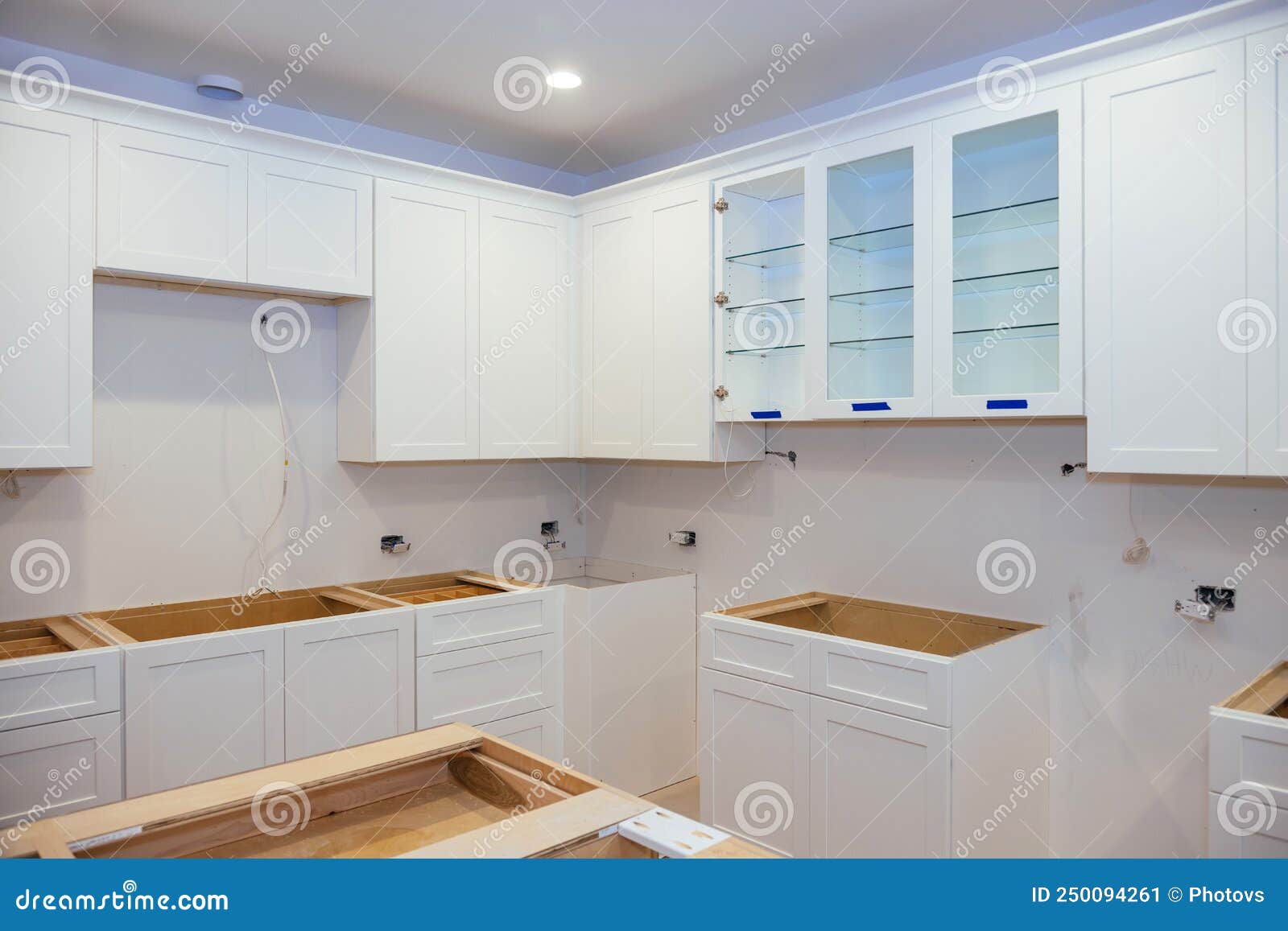 Assembly and Installation of Modern Kitchen Stock Image