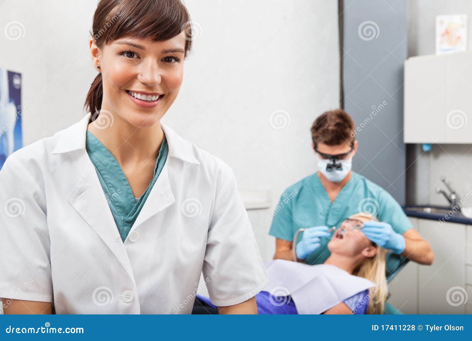 Assistant with Dentistry Work in the Background Stock Photo Image of