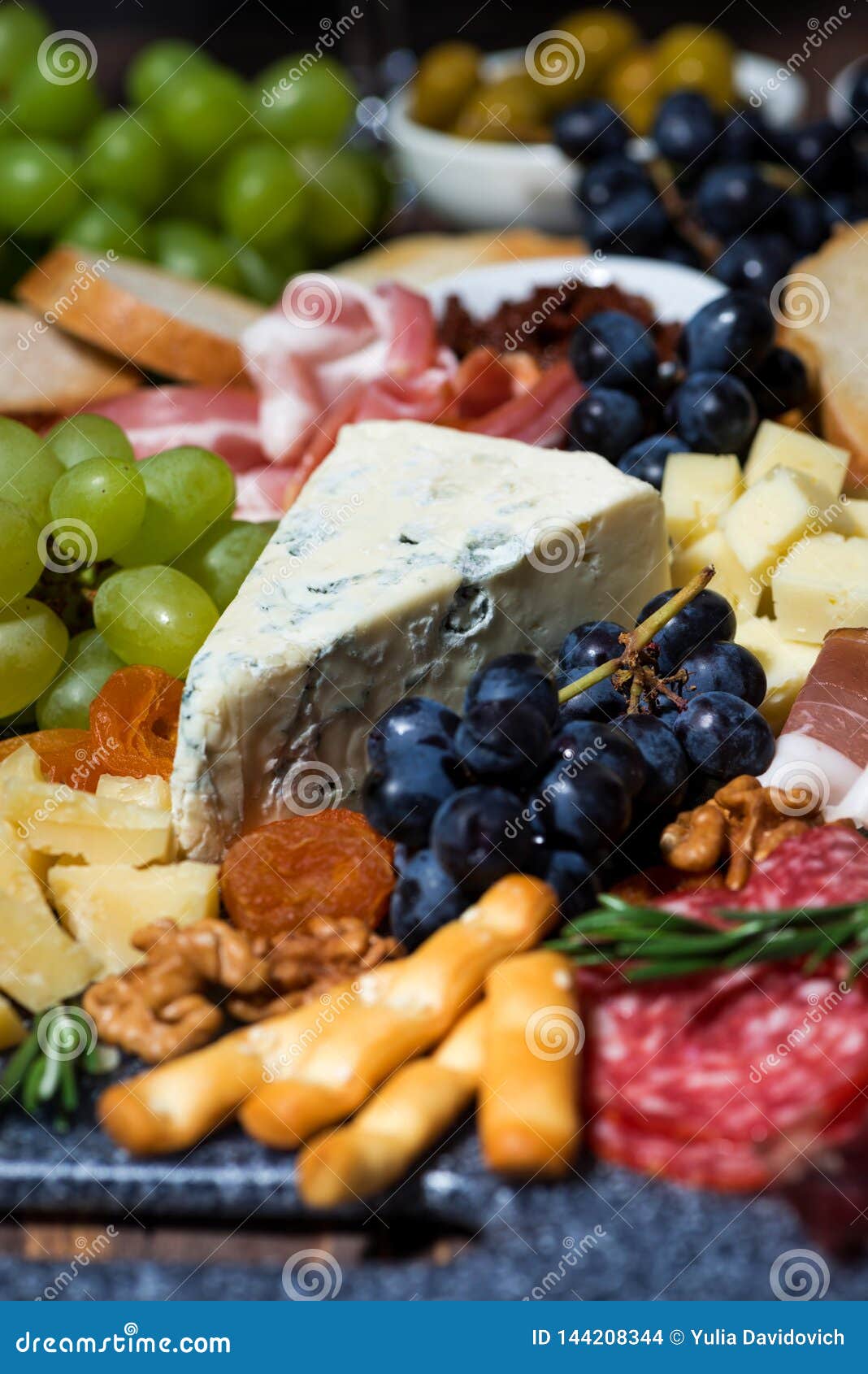 Assorted Cheeses, Fresh Fruits and Meats, Vertical Selective Focus