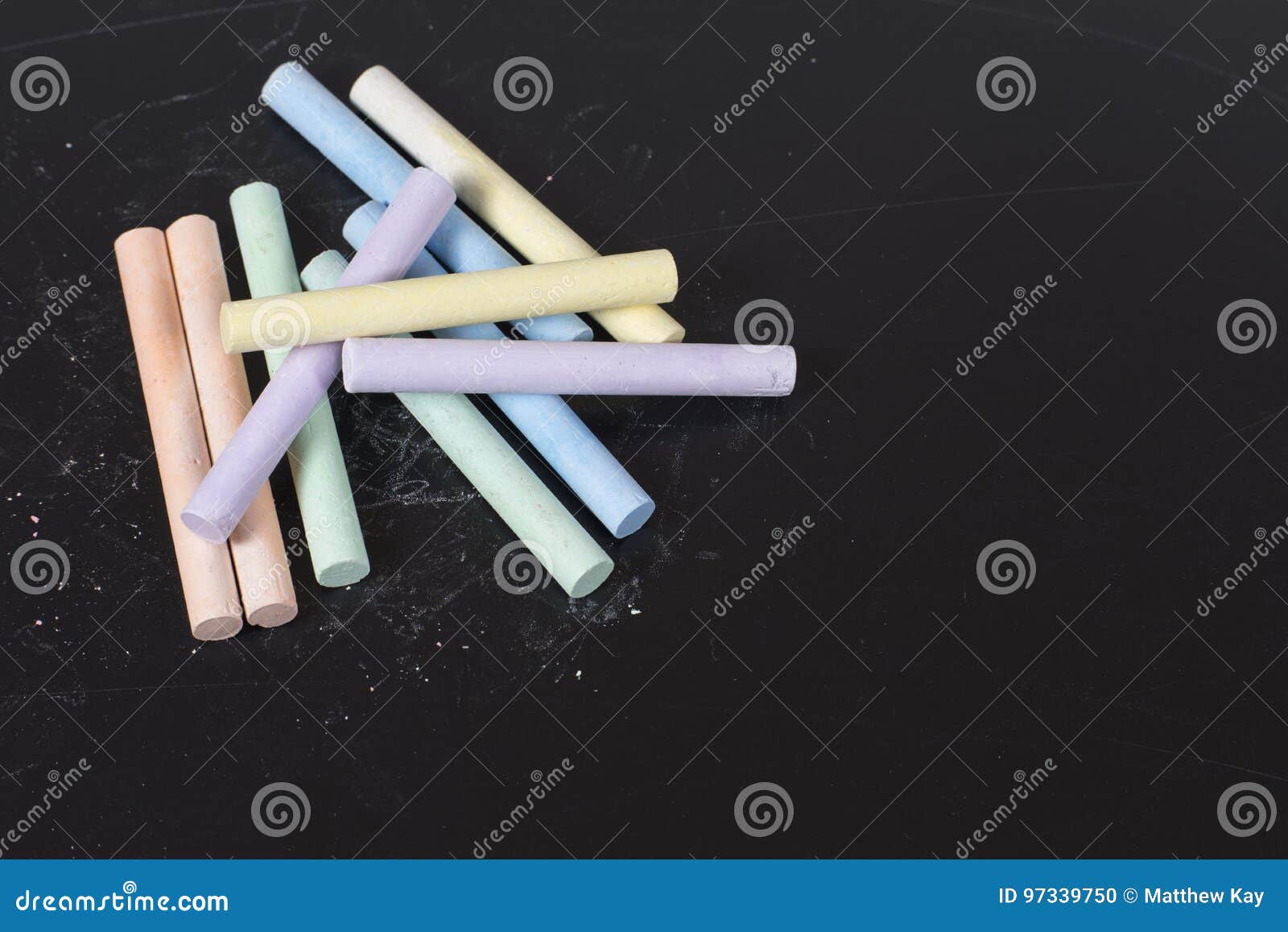 Assorted Colored Chalks On A Chalkboard Or Slate Stock Photo Image of education, pile 97339750