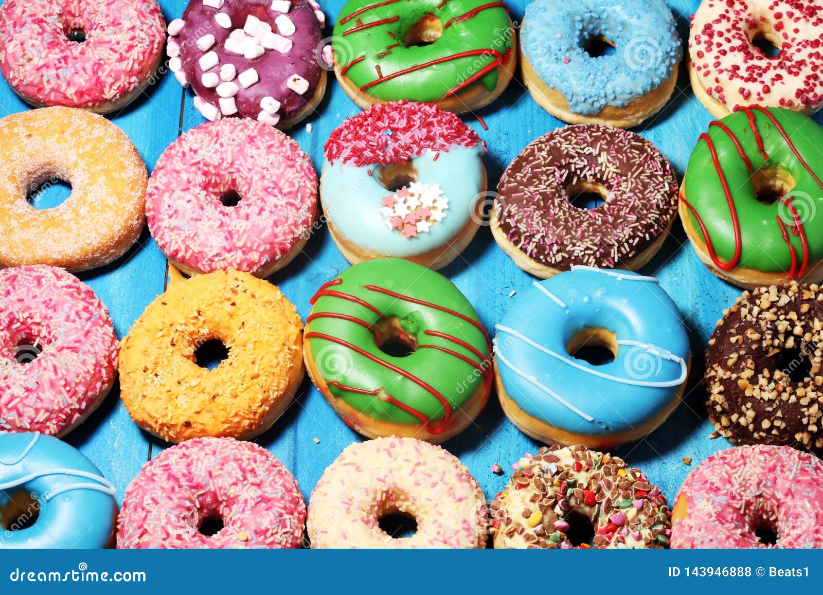 Assorted Donuts with Chocolate Frosted, Pink Glazed and Sprinkles