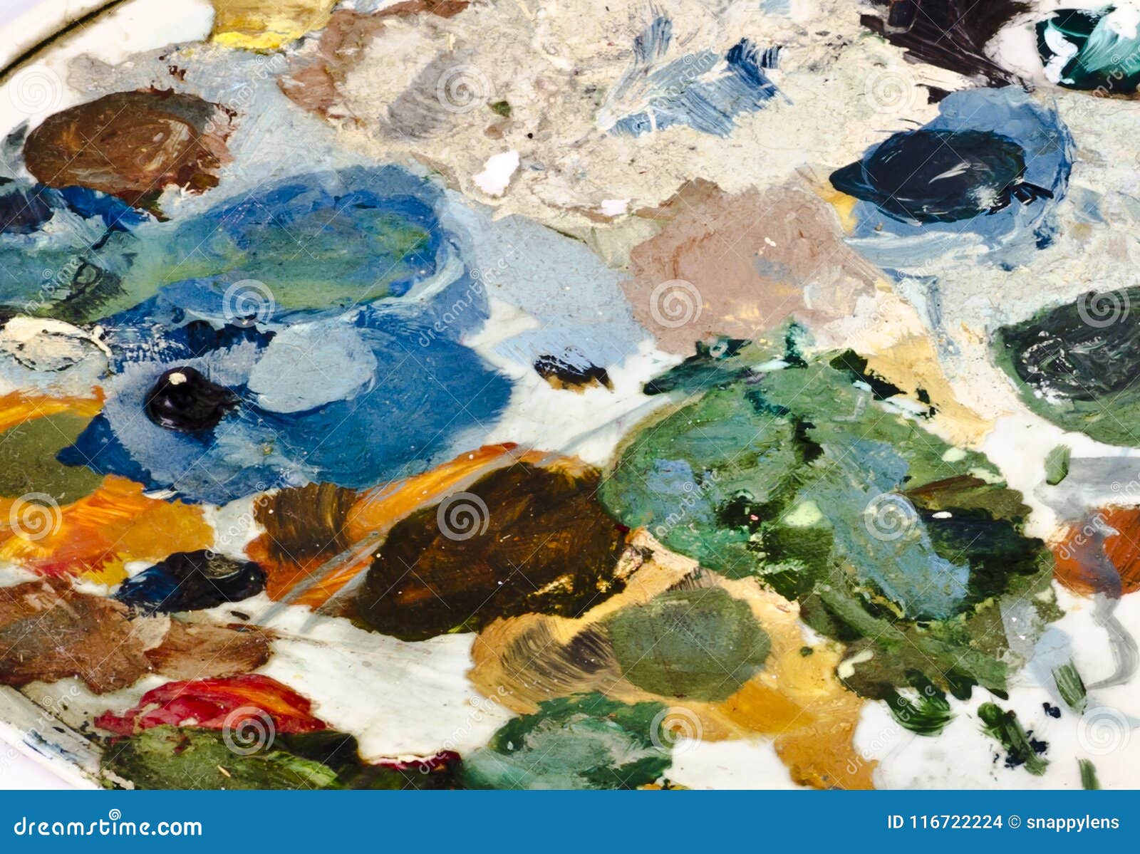 assorted dry colors on a painters palette