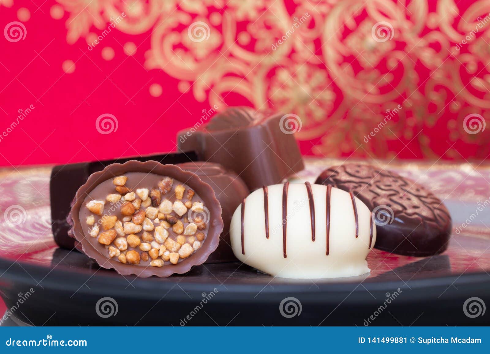 Assorted Gourmet Chocolate Candies in the Dish. Stock Image - Image of