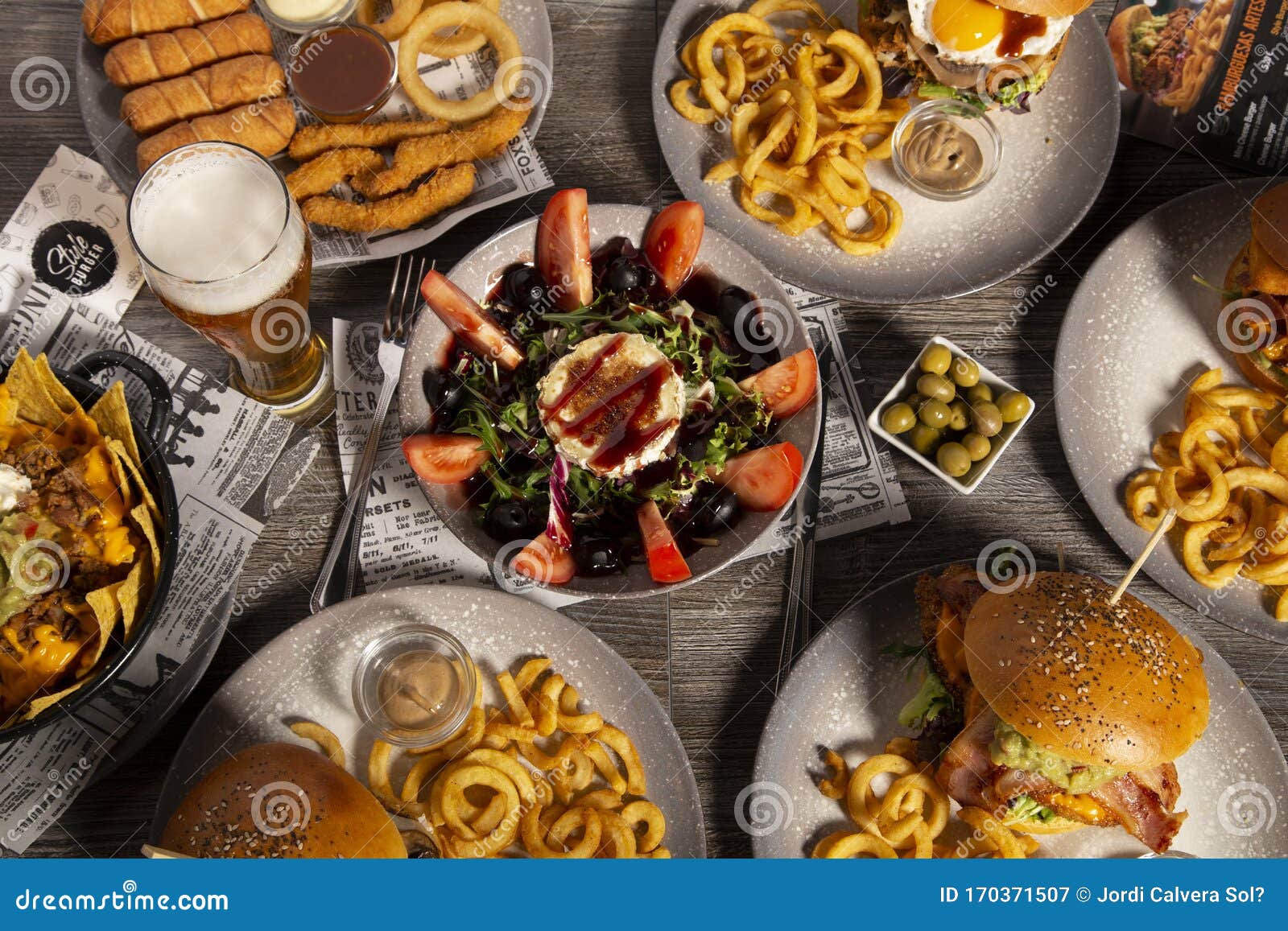 Assorted Hamburger Dishes and Tapas on Wooden Table Seen Above. Isolated Image - Image fast, hamburger: 170371507