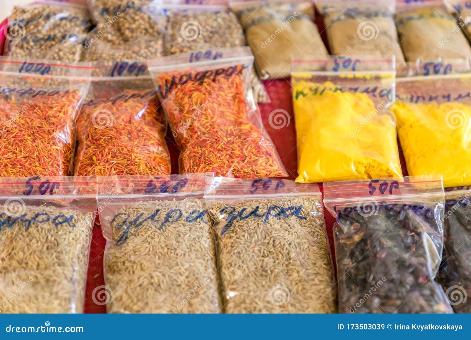 Assorted Herbs and Spices in Clear Plastic Bags on the Market Stock