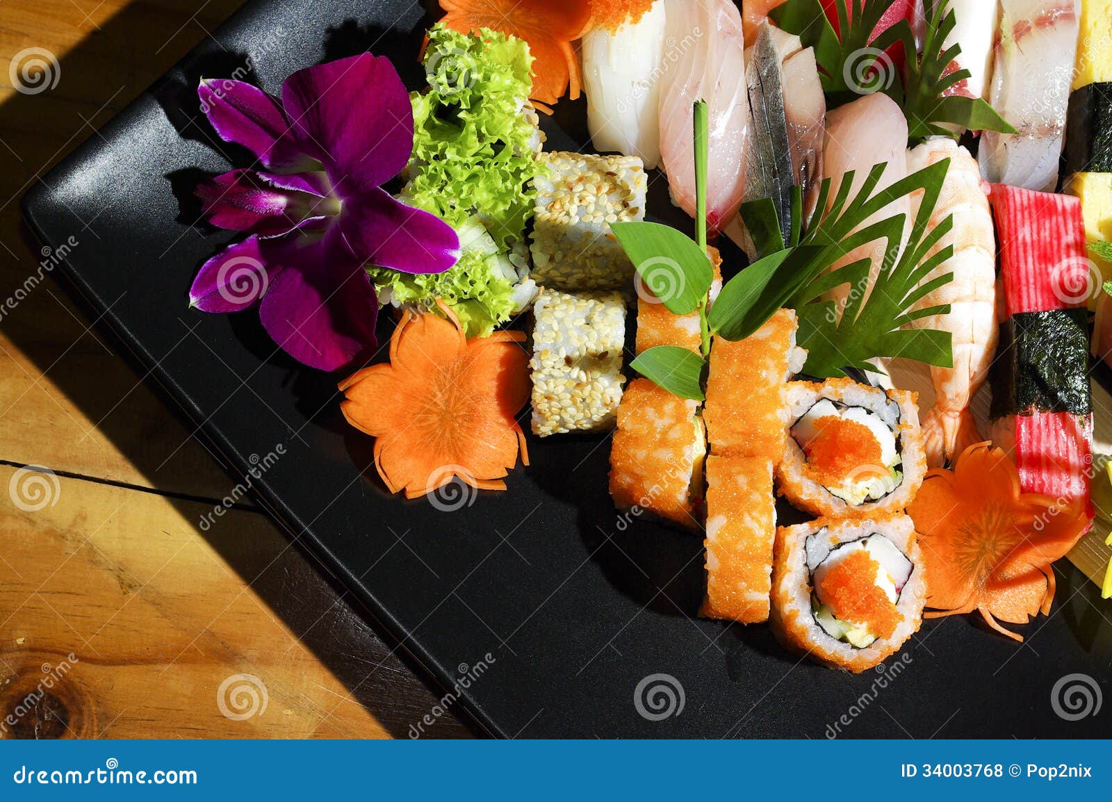 Assorted Japanese Sushi on a Black Plate. Stock Photo Image of roll