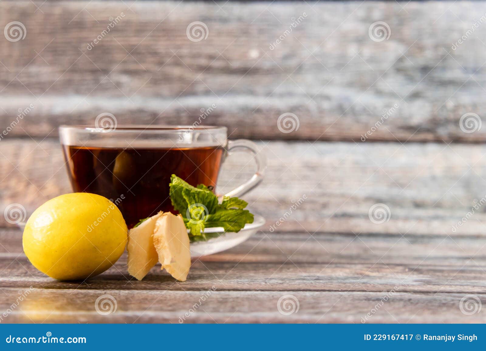 Assortment of Black Tea with Mint Leaves,ginger Slices and Lemon with