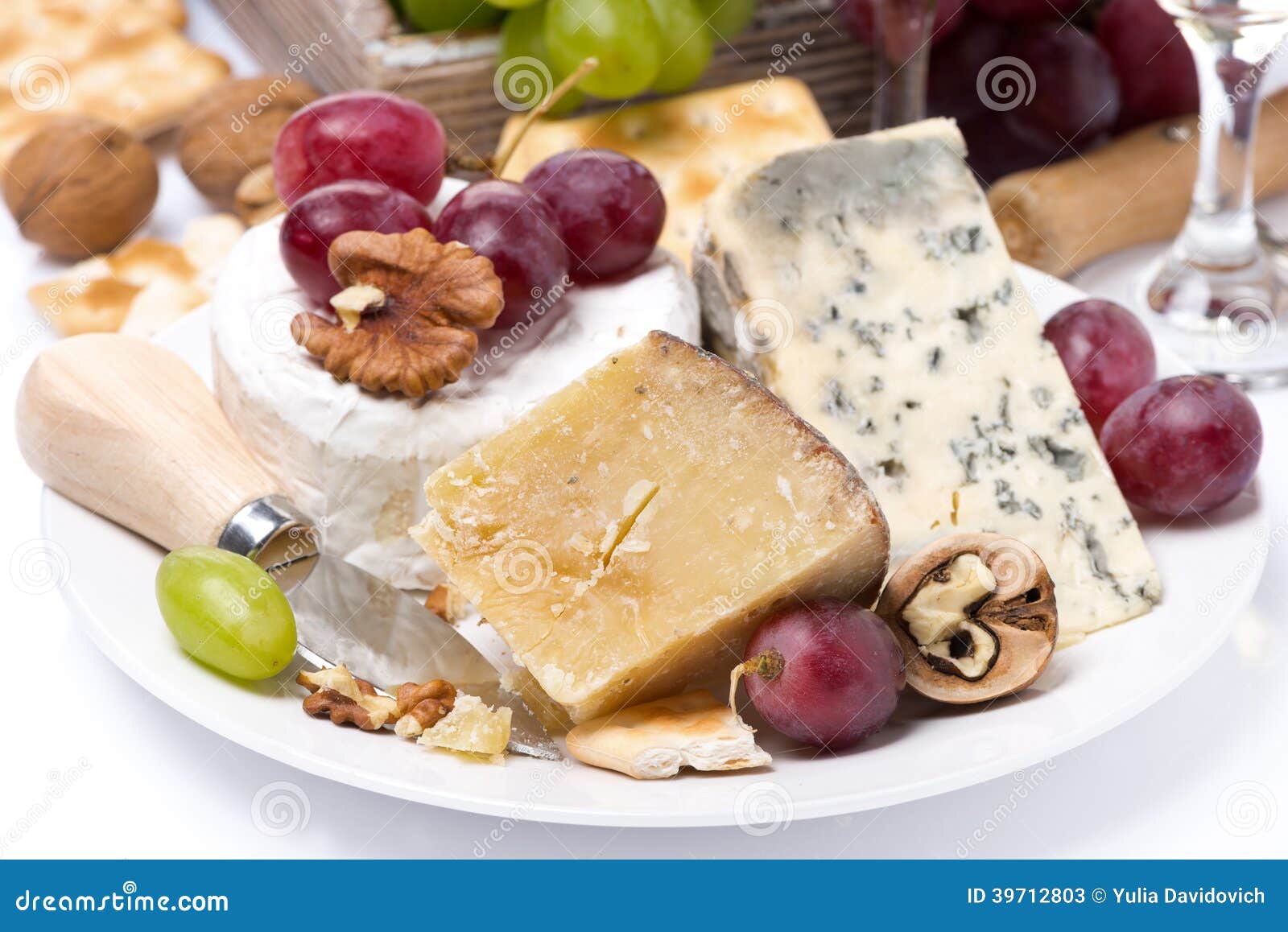 Assortment of Cheeses, Grapes and Crackers, Closeup Stock Image