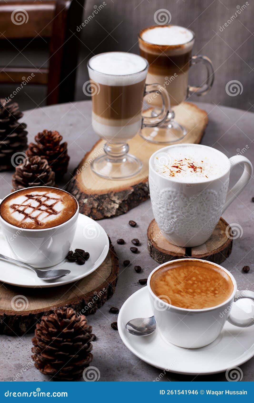 assortment of coffee cafe latte, caramel latte, americano, macchiato, espresso, cappuccino served in cup  on table side