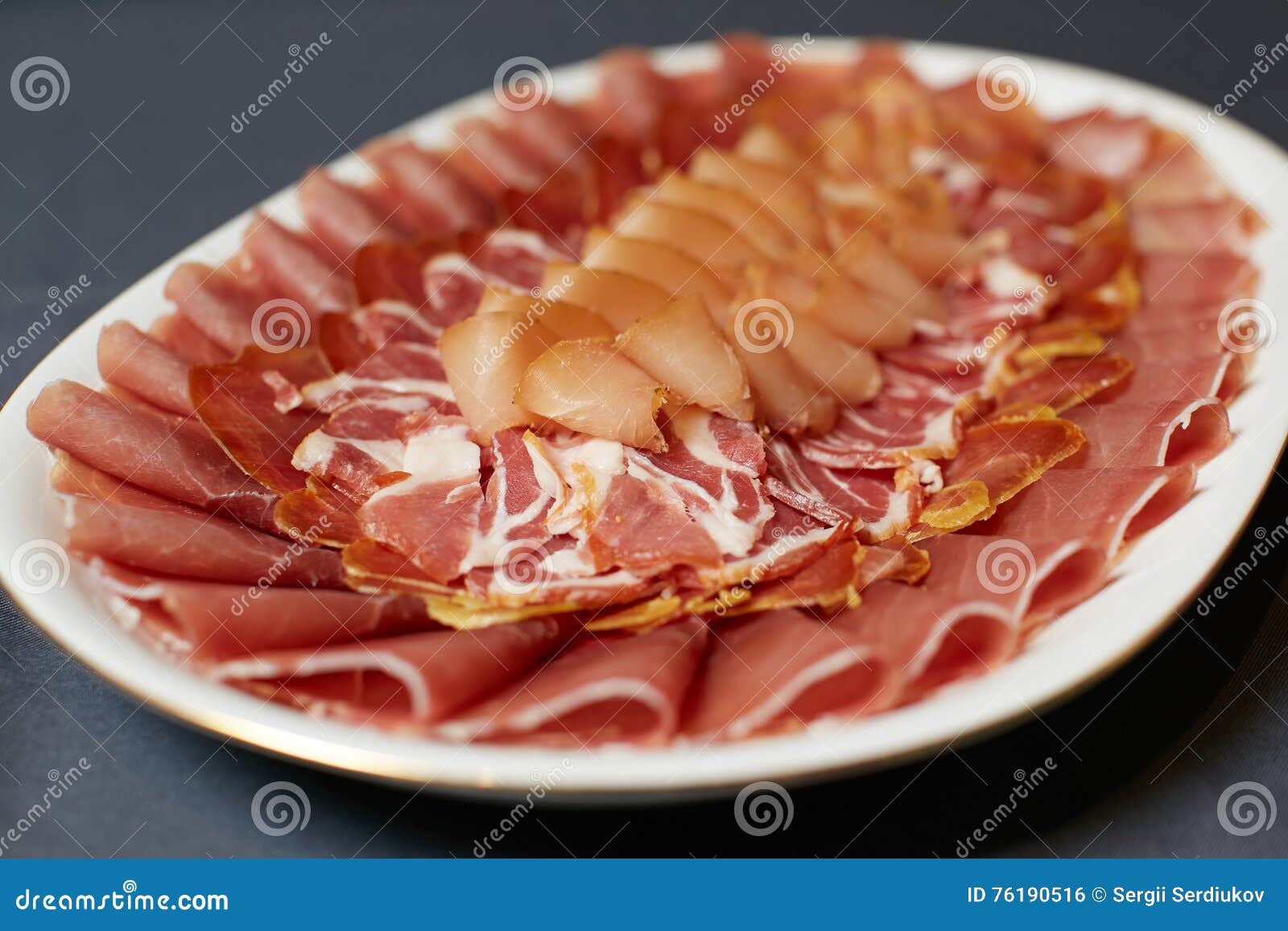 Assortment of Delicatessen Cold Meat, Salami, Ham and Bacon Stock Photo