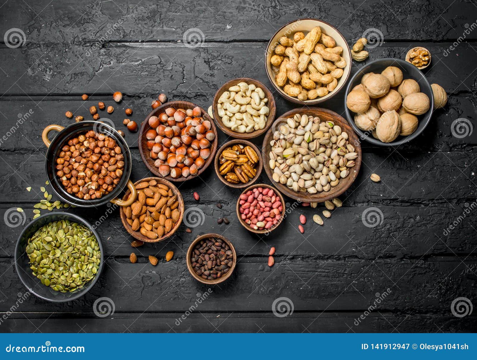 Assortment of Different Nuts in Bowls Stock Image Image of mixed