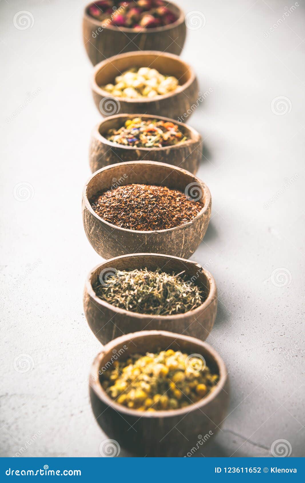 Assortment of Dry Tea in Coconut Bowls. Stock Photo Image of copy