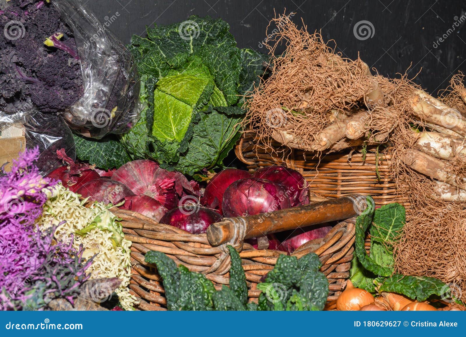 Assortment of Fresh Salads and Vegetables at the Market Stock Image
