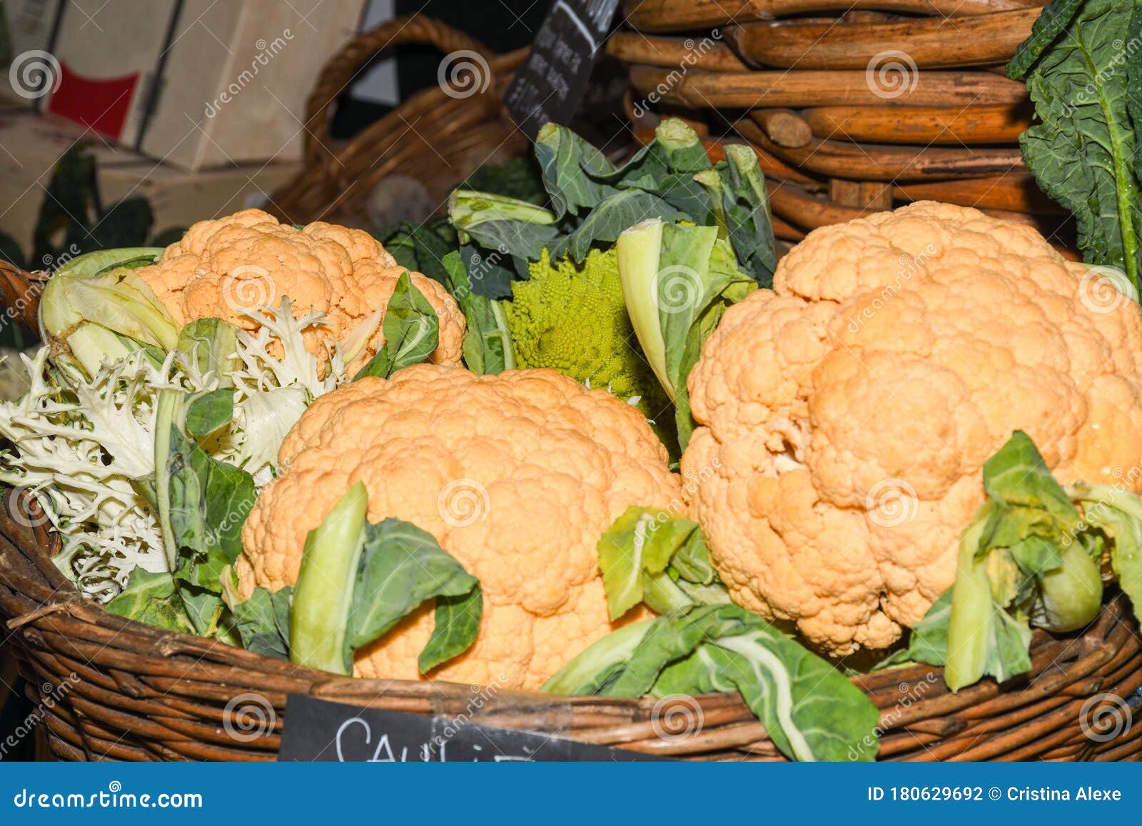 Assortment of Fresh Salads and Vegetables at the Market Stock Photo