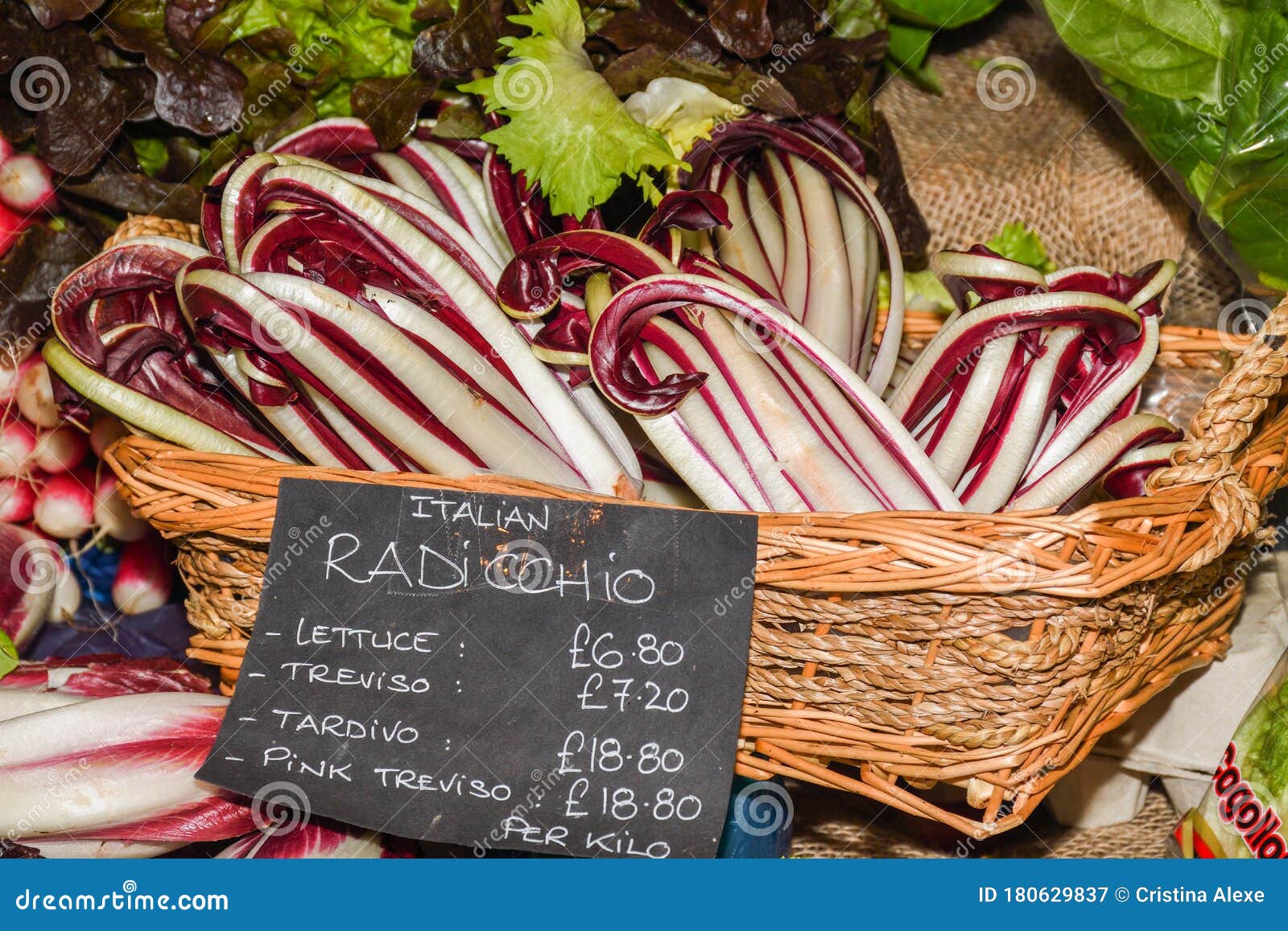 Assortment of Fresh Salads and Vegetables at the Market Stock Image