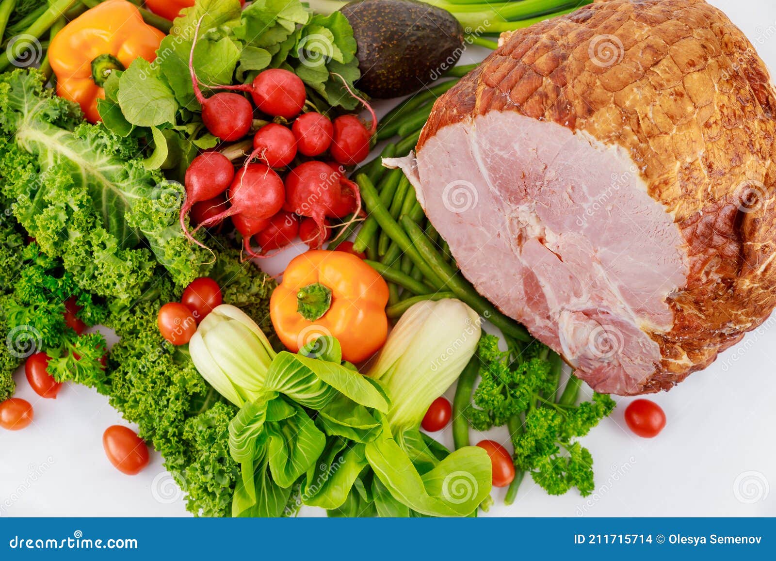 Assortment of Fresh Vegetables and Whole Pork Ham Stock Photo Image