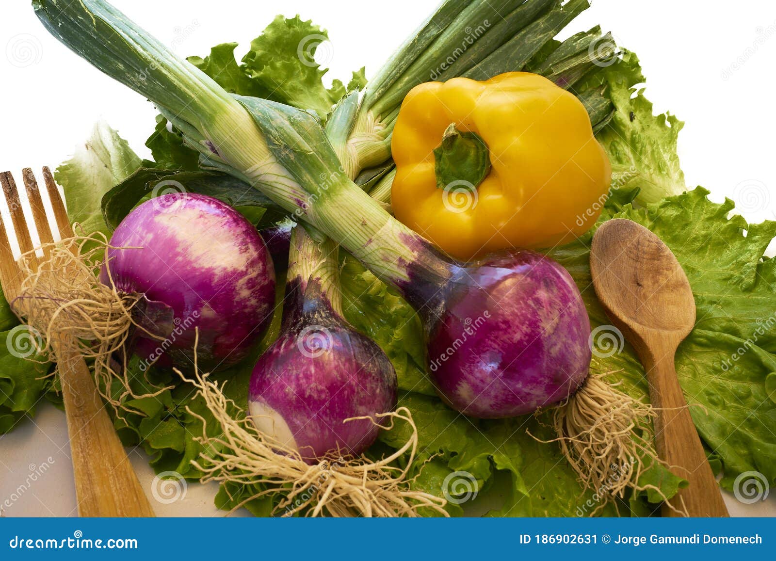 fresh fruits and vegetables on lettuce background