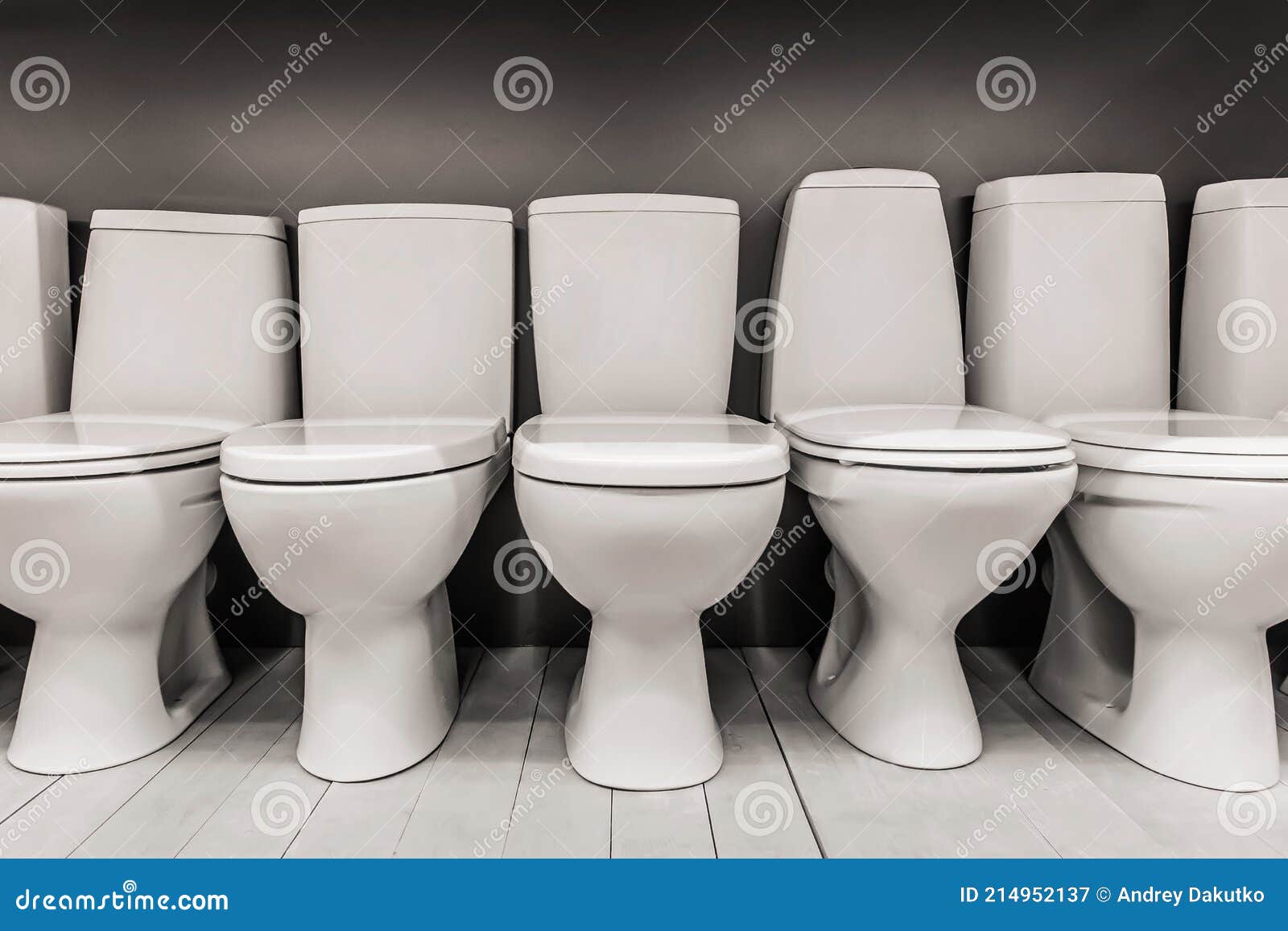 An Assortment of New Modern White Toilets in a Hardware Store Stock
