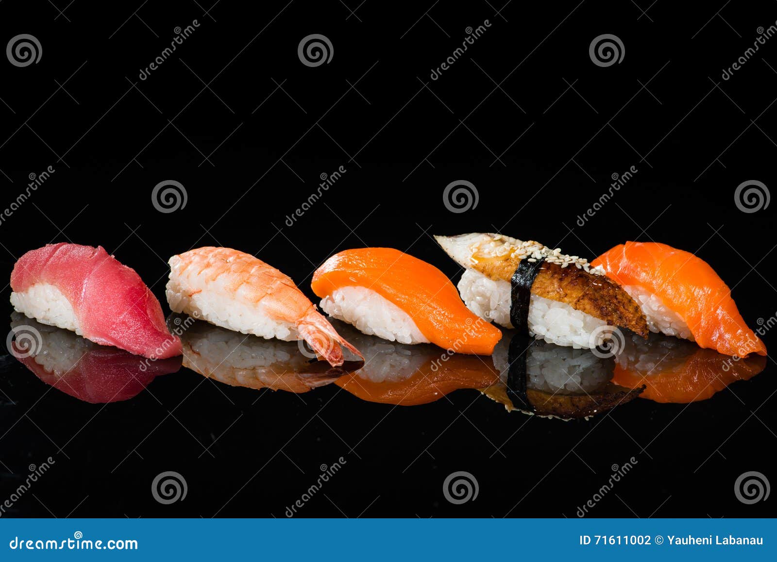 assortment of nigiri sushi with shrimp, salmon, tuna and eel