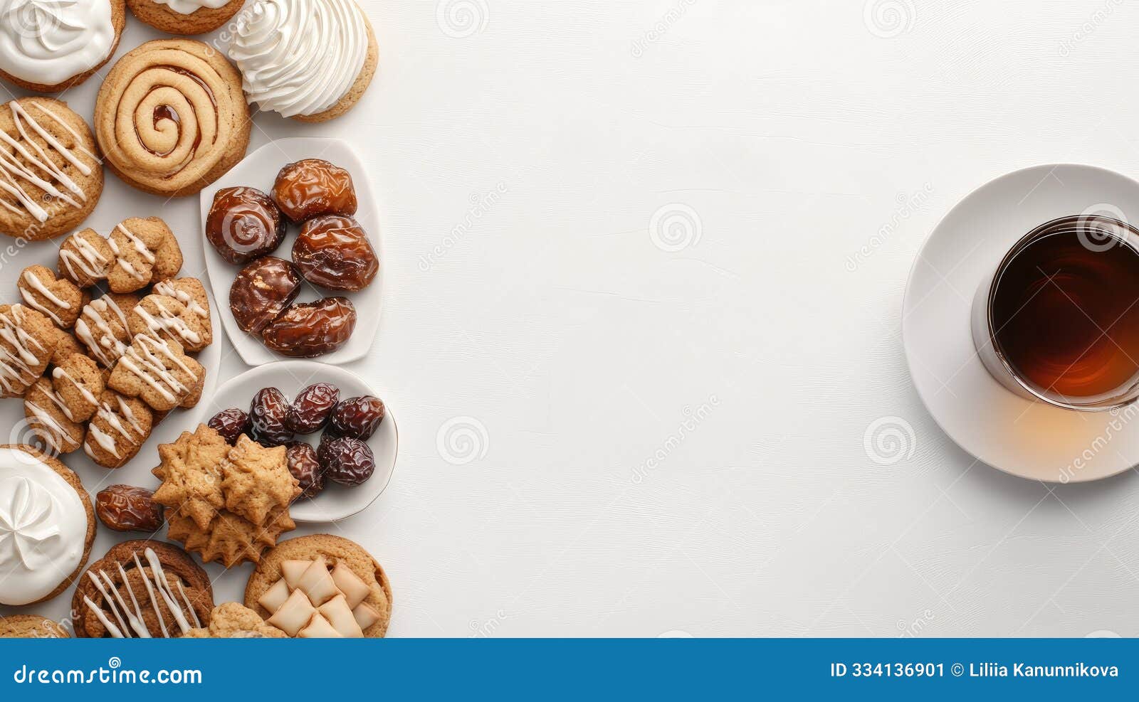 an assortment of ramadan cookies, dates, and metallic teacups filled with black tea create a warm atmosphere, perfect
