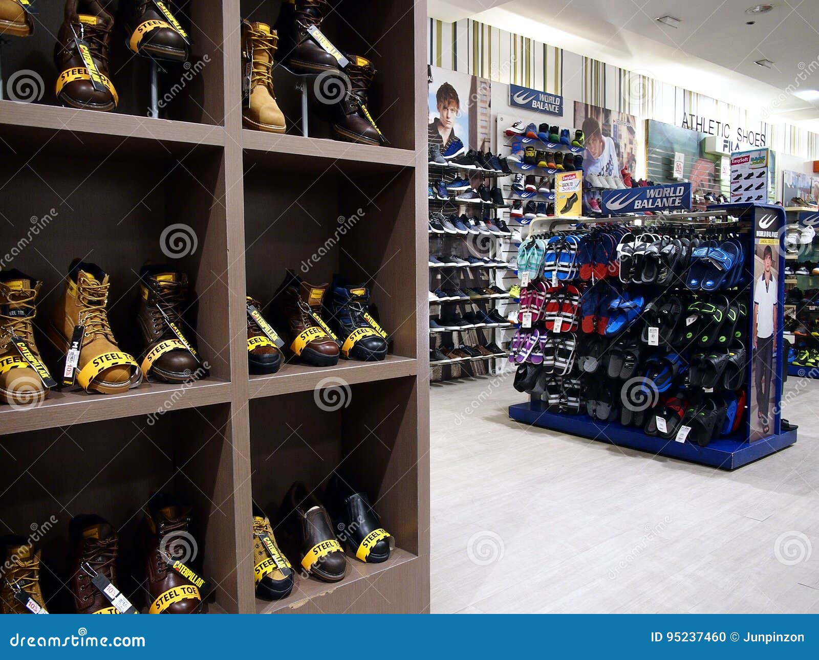 An Assortment of Shoes and Footwear on Display at a Store. Editorial ...