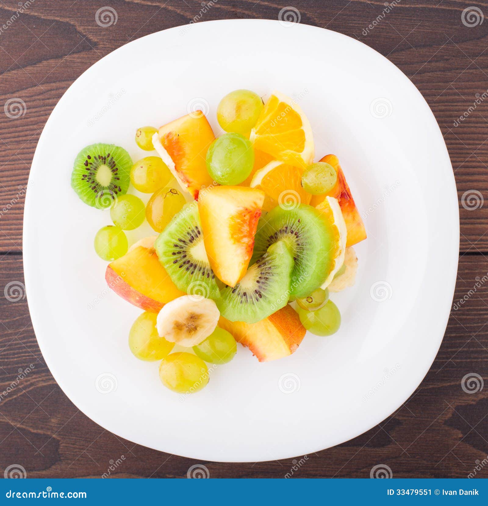 Assortment of Sliced Fruits on Plate Stock Image Image of tasty