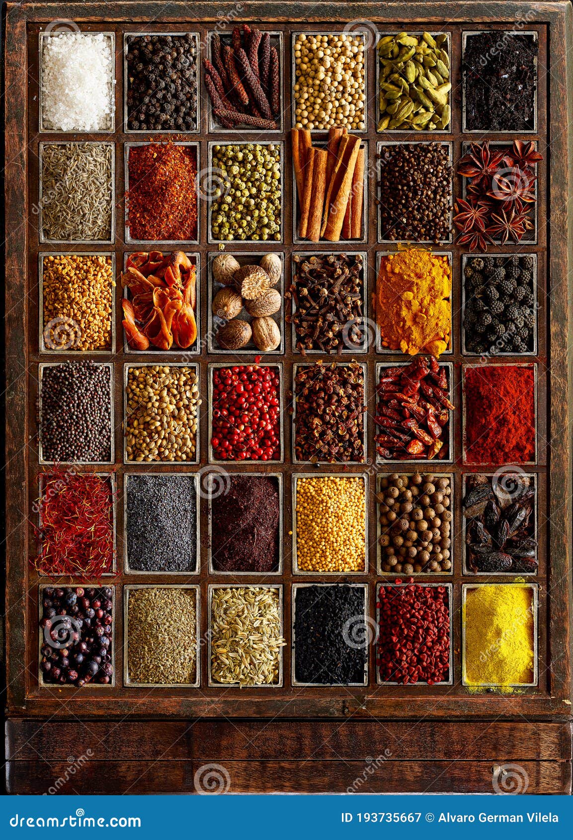 assortment of spices in a wooden box