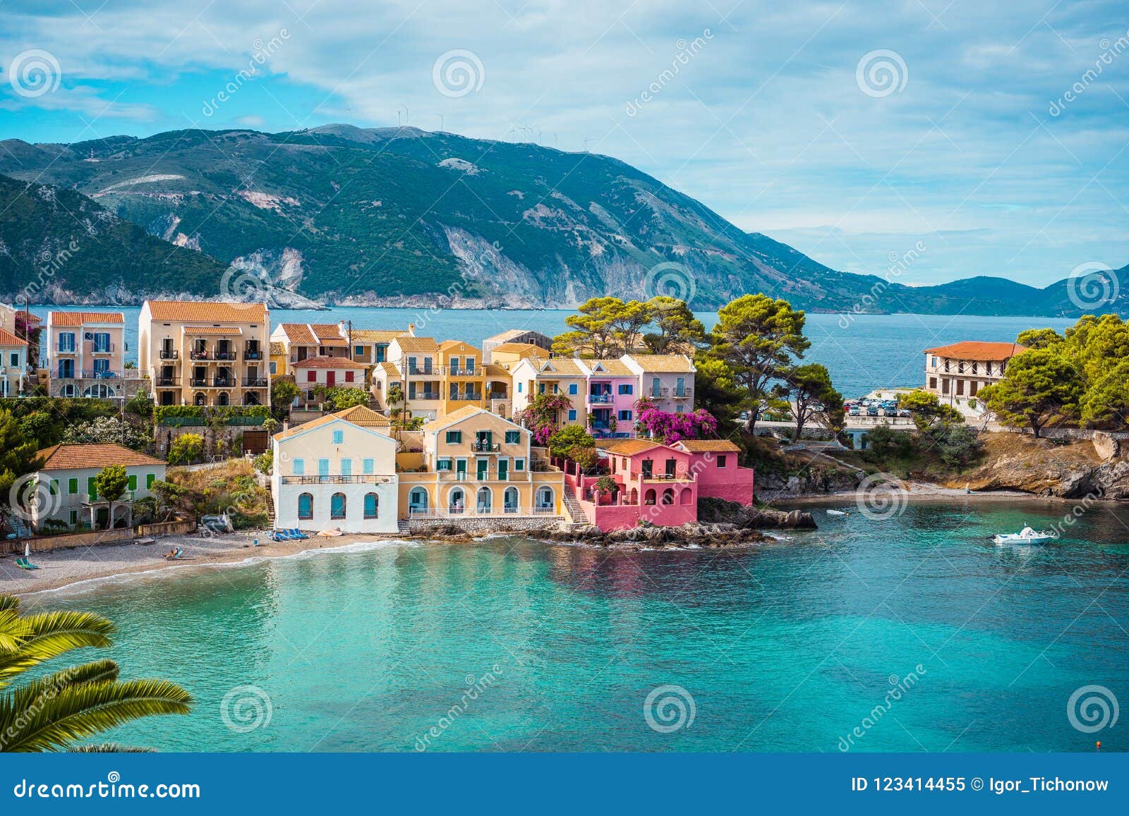 assos village. beautiful view to vivid colorful houses near blue turquoise colored transparent bay lagoon. kefalonia