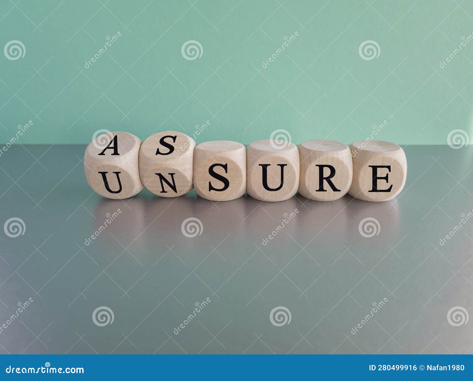 assure or unsure . turned wooden cubes and changed the concept word unsure to assure.