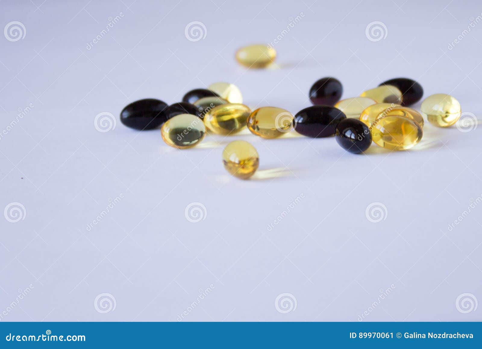 Astaxanthin and Fish Oil. Gel Capsules on White Background Stock Image